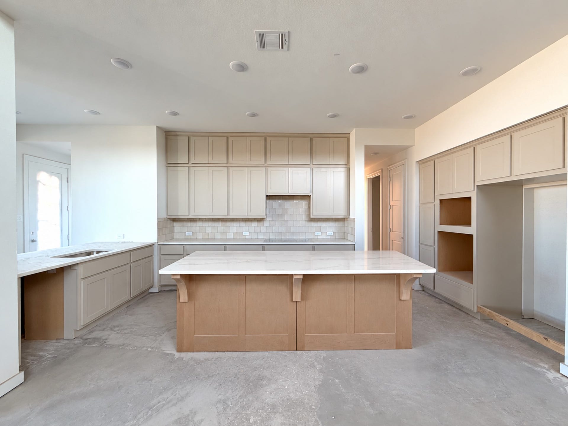 7819 Elizabeth Creek Court, Richmond, TX 77469 Designer U shaped kitchen allows for an oversized island with abundant cabinetry