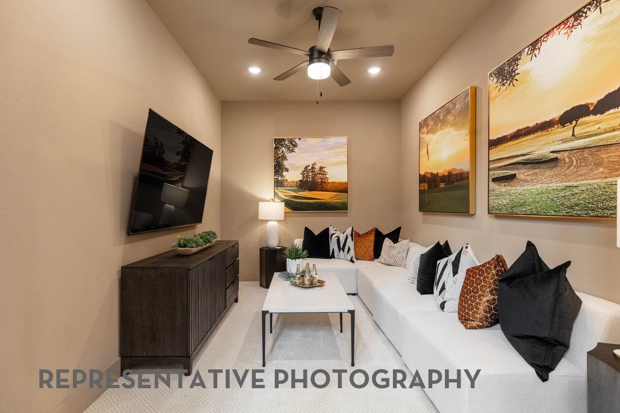 7819 Elizabeth Creek Court, Richmond, TX 77469 Entertainment room/Flex space designed for movie nights, game days, and relaxing with family and friends.