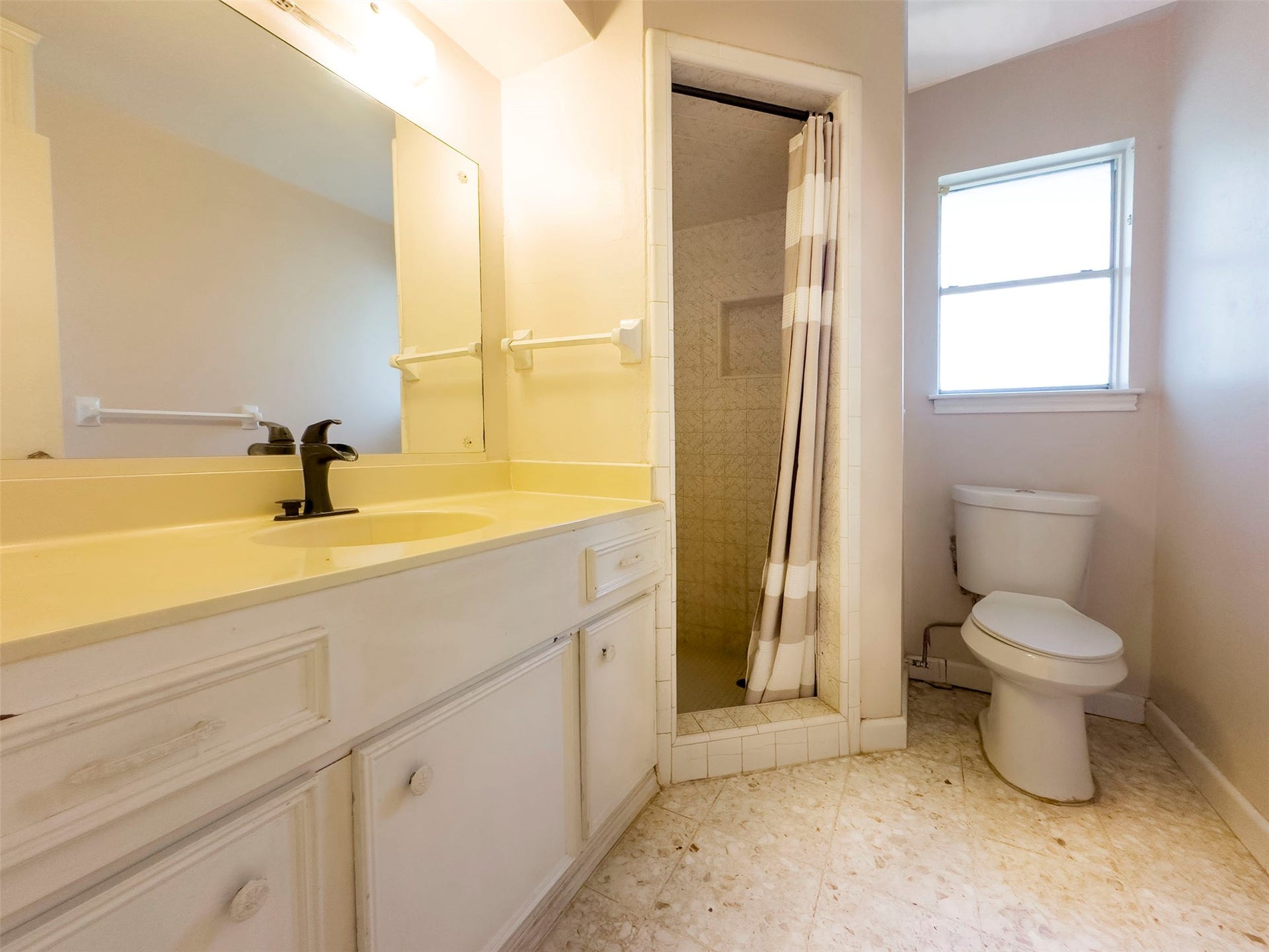 Primary bathroom with shower.