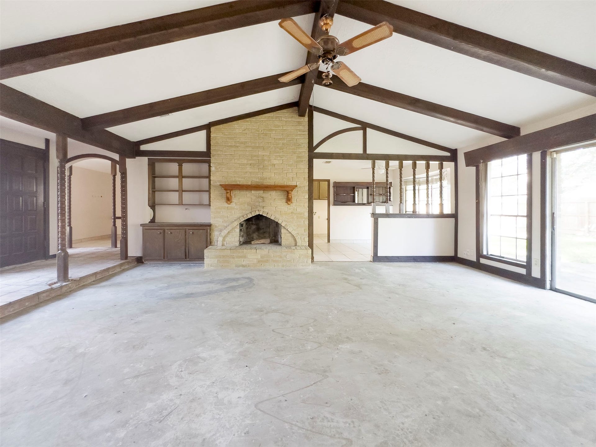 Enormous living room with beamed ceiling