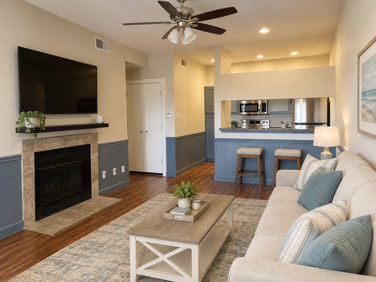 2121 El Paseo Street, #1511, Houston, TX 77054 Virtually staged to highlight the rooms versatility, with space to relax by the fireplace, enjoy a casual meal at the kitchen bar, or gather with friends while staying connected to the heart of the home.