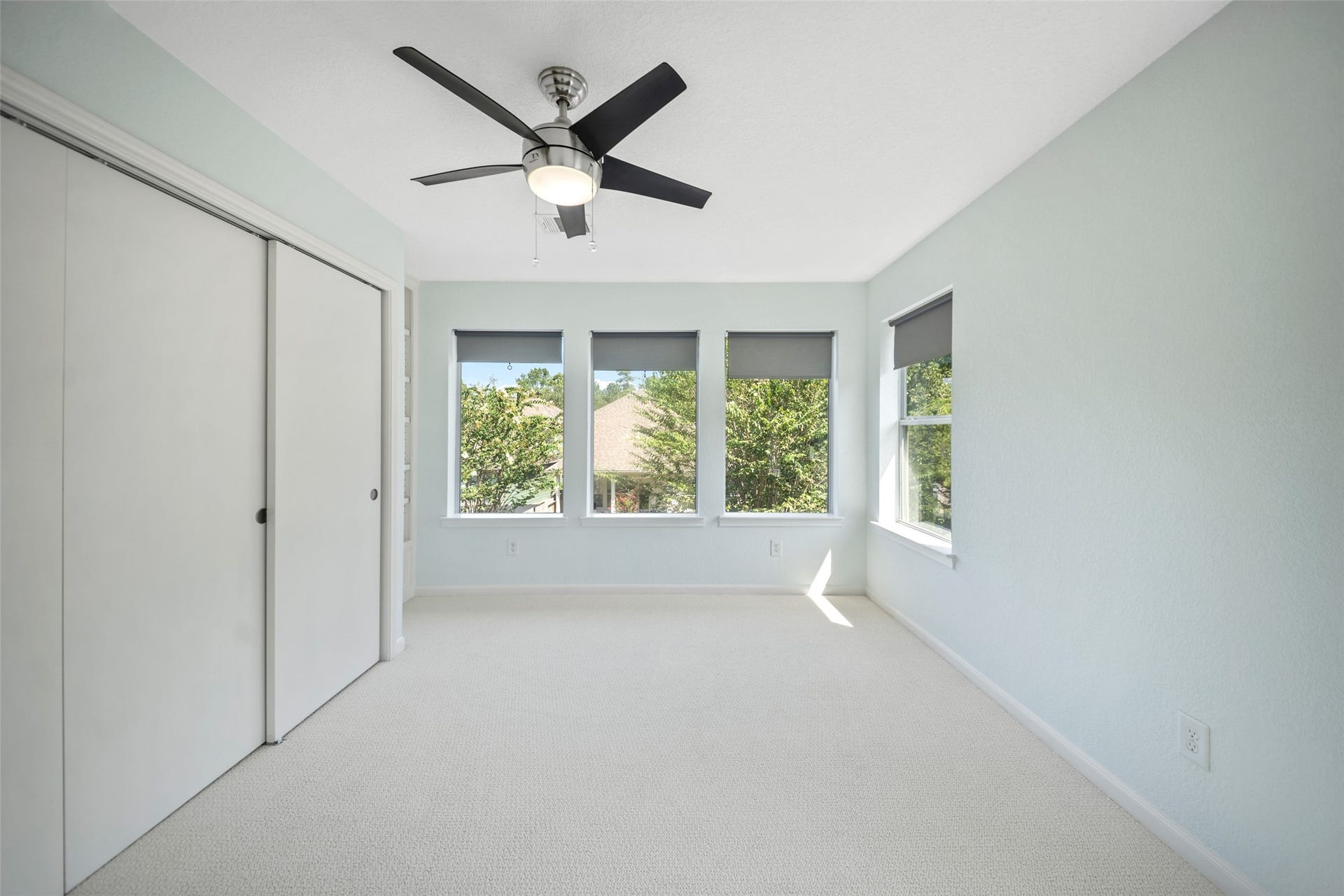 first bedroom upstairs next to primary. has a built in bookshelf to the right of the closet!