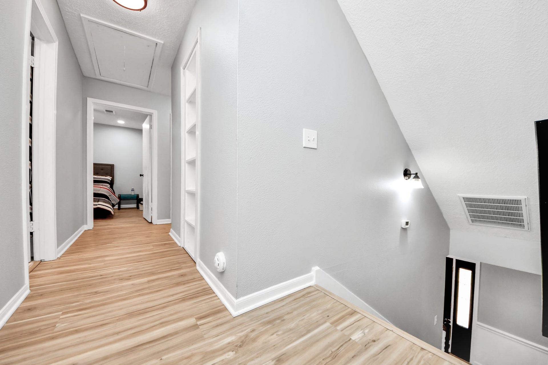 2903 Blue Glen Lane, Houston, TX 77073 The central junction of the quiet quarters. This second-story landing branches off seamlessly into the independent sleeping sanctuaries and secondary baths.