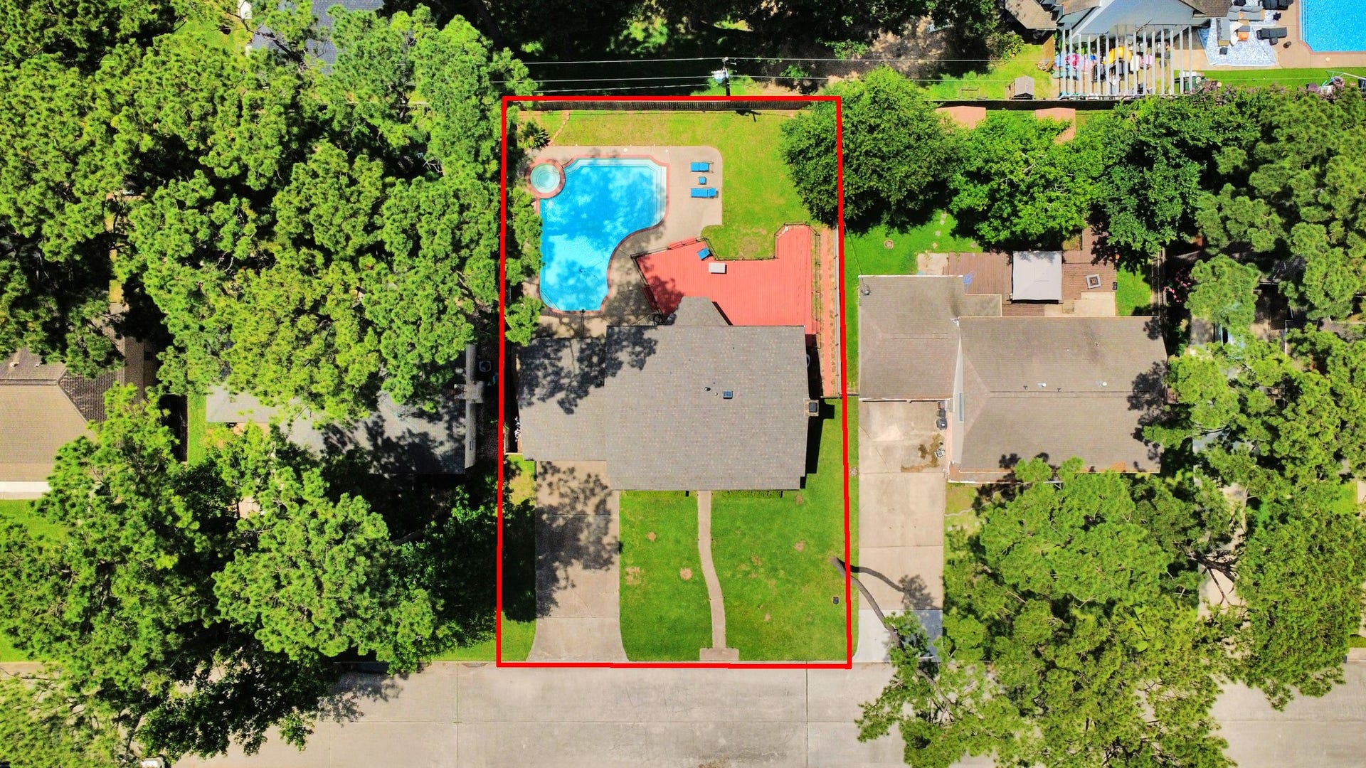 2903 Blue Glen Lane, Houston, TX 77073 A birds-eye view of pure potential. This precise, top-down perspective showcases the true scale of the lot, illustrating how perfectly the residence, sweeping yard, and pool pavilion harmonize together.