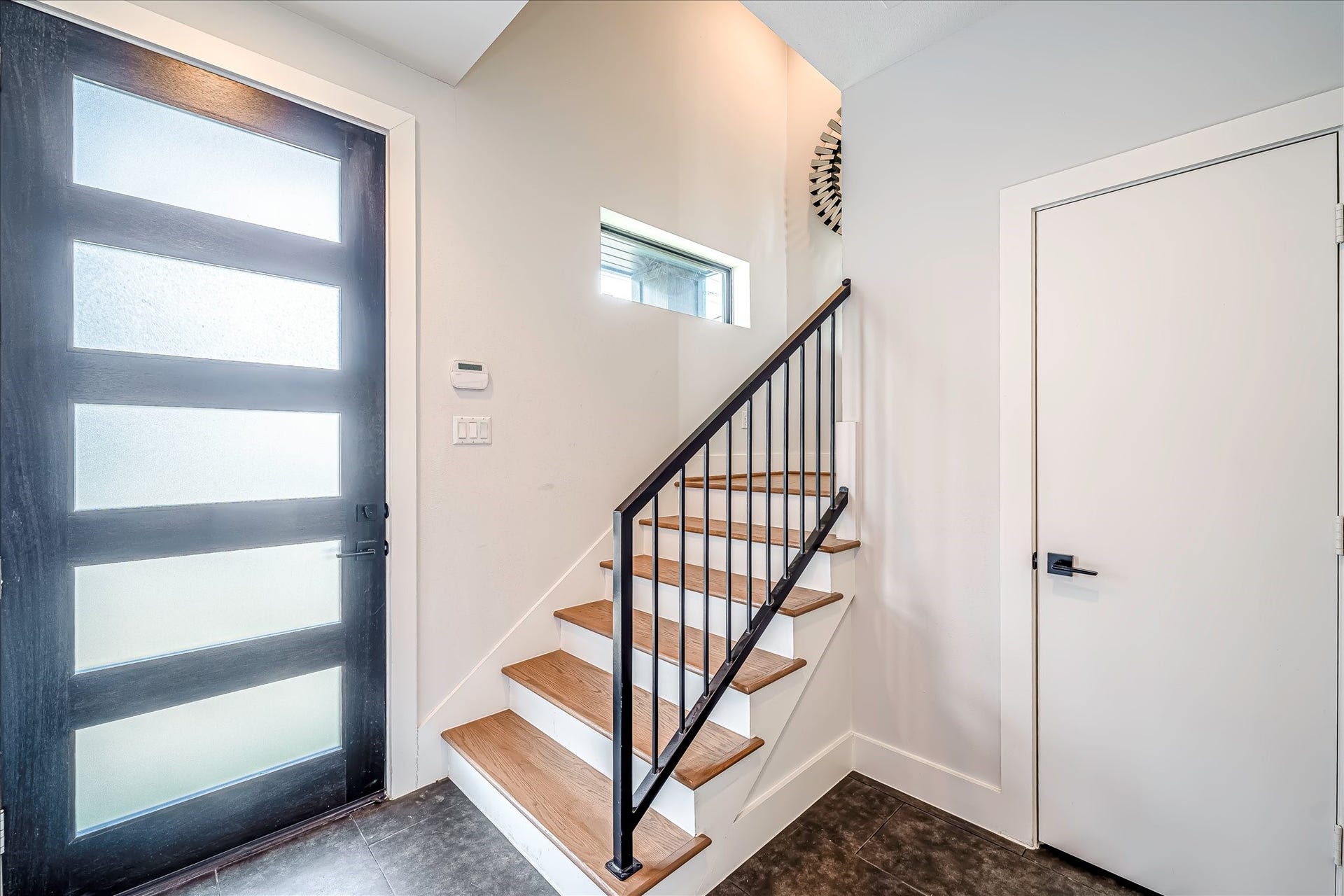 Home includes a security system with exterior cameras for added peace of mind.