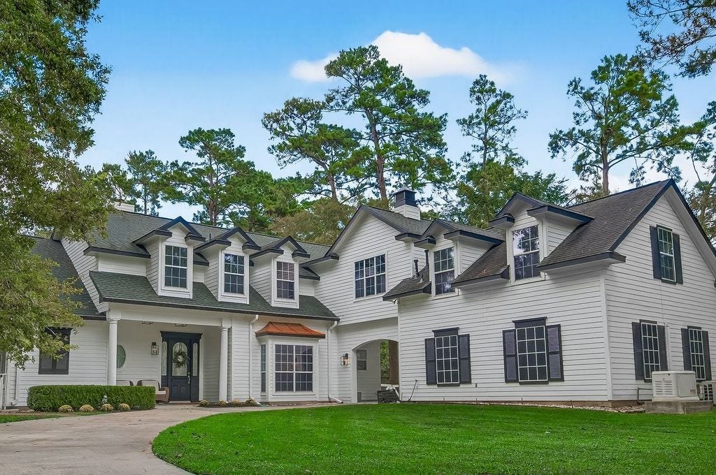 25906 Fawnwood Street, Magnolia, TX 77355 Welcome home to this modern farm house style home. Exterior is constructed with concrete board known for low maintenance.