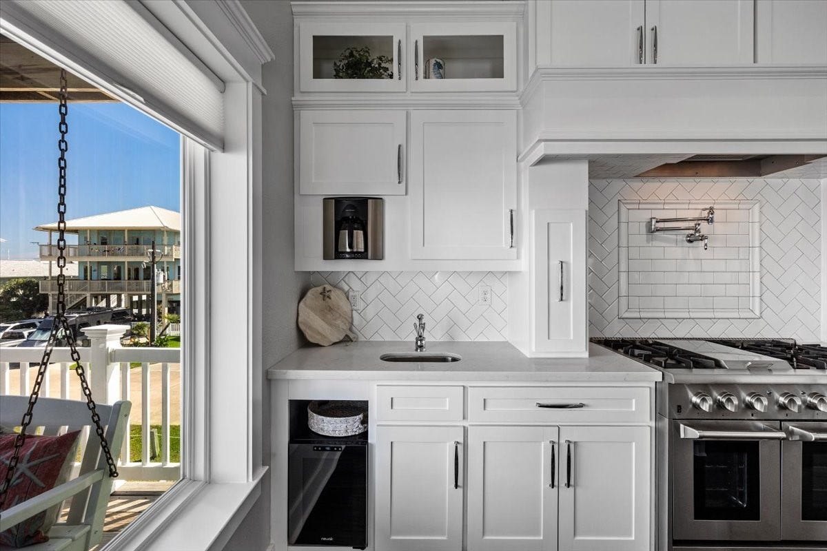 3728 Sabrina, Galveston, TX 77554 Plumbed coffee pot built into the wall and wine cooler
