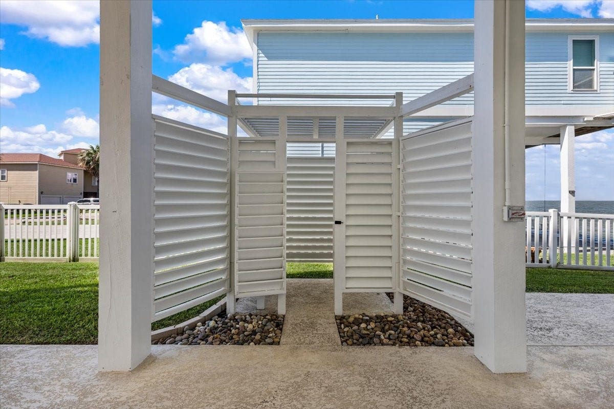 3728 Sabrina, Galveston, TX 77554 Outdoor shower with privacy doors