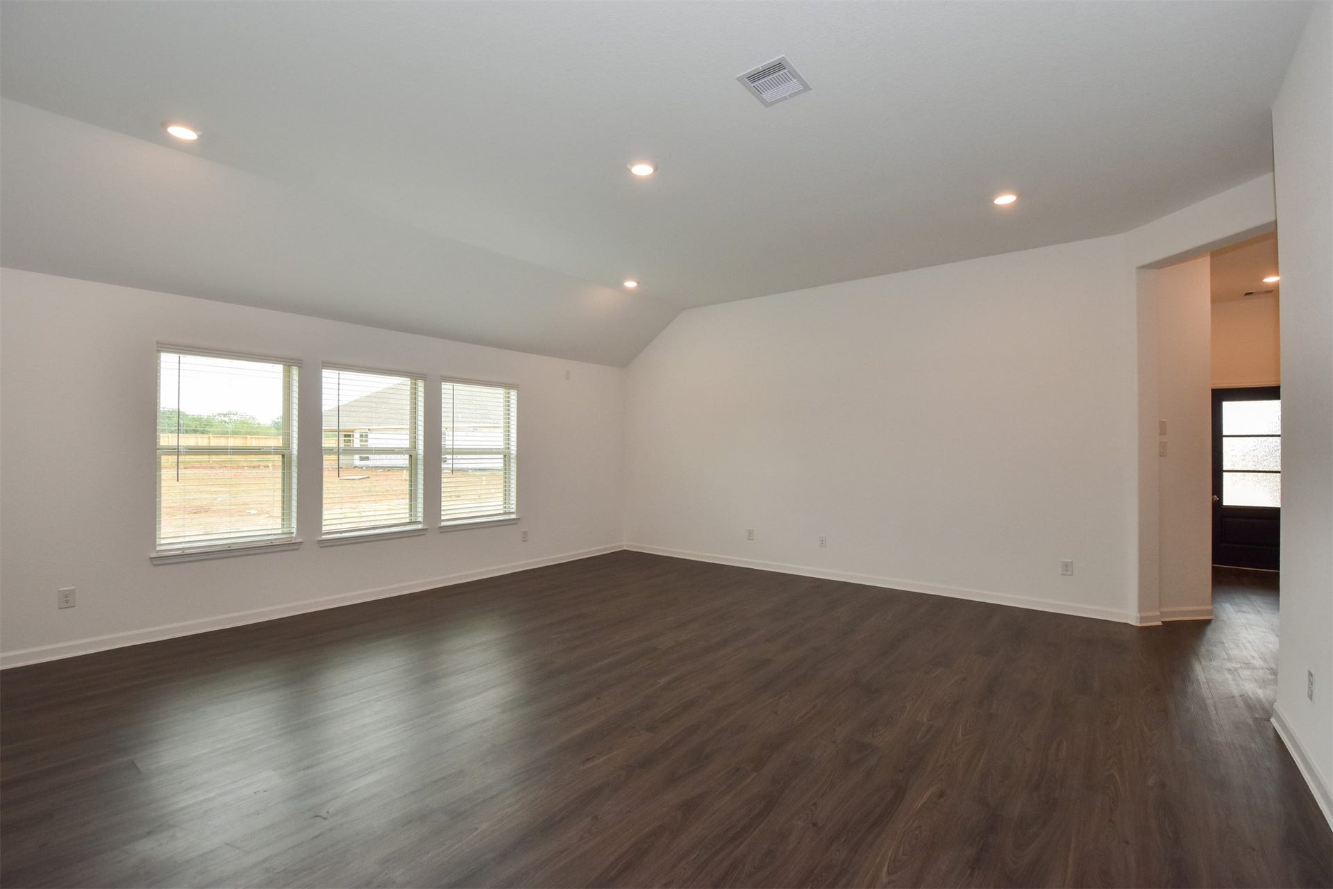 3743 Homestead Ridge Lane, Richmond, TX 77406 From here you can see the windows allow for tons of natural lighting to flood the family room