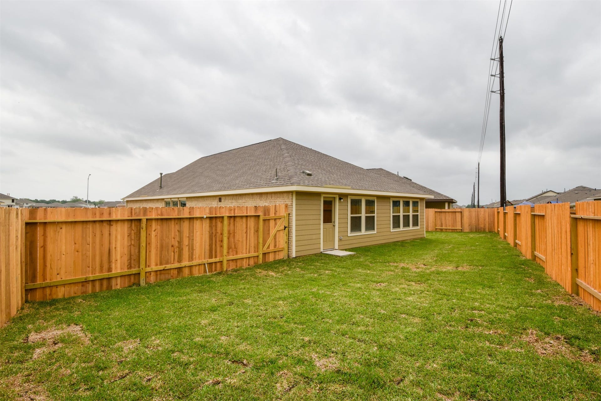 3743 Homestead Ridge Lane, Richmond, TX 77406 Large backyard area perfect for outdoor playground or above ground pool