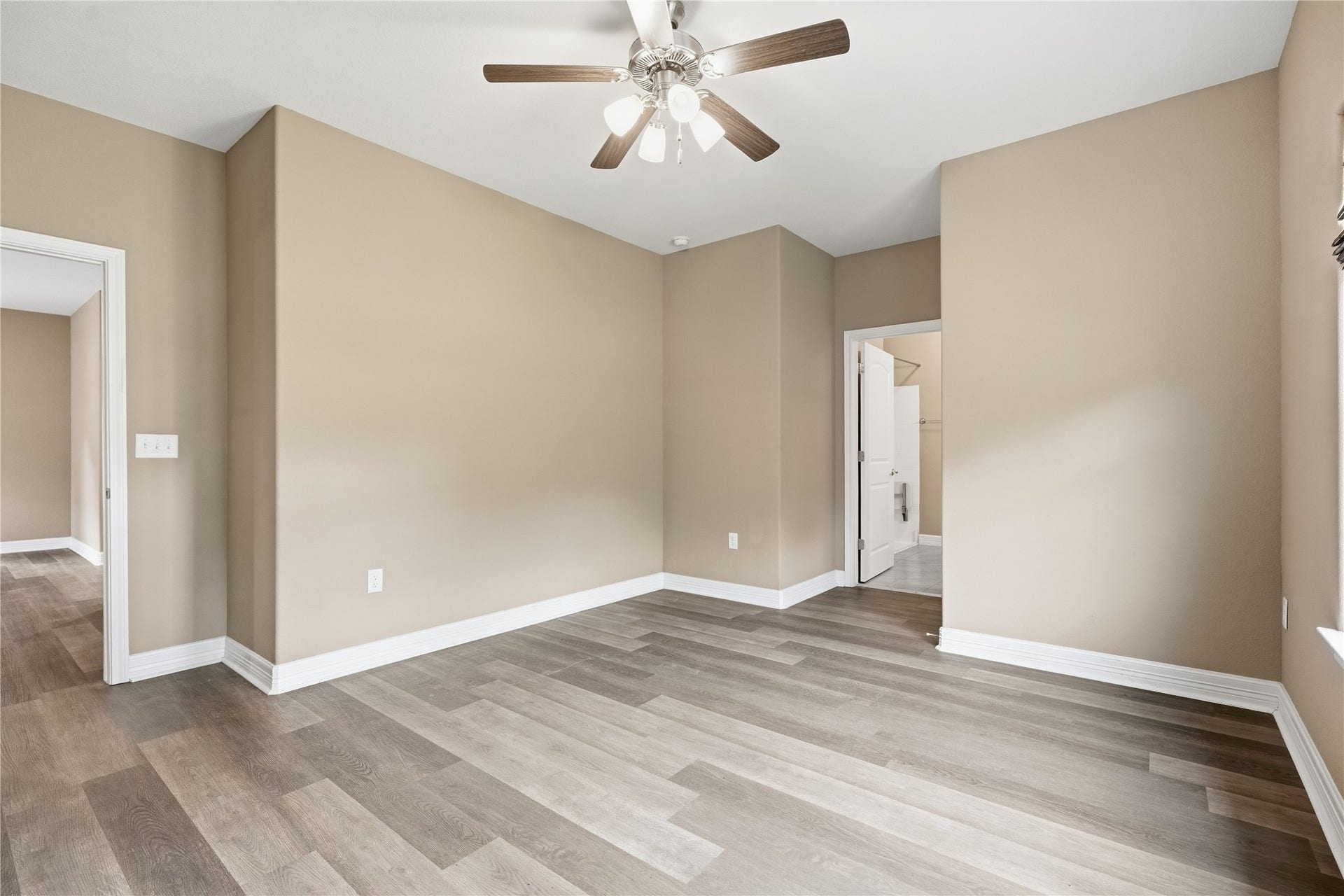 102 20th Avenue N, Texas City, TX 77590 Another view of the primary bedroom shows the wider doorways and direct access to the private bathroom with accessibility features.