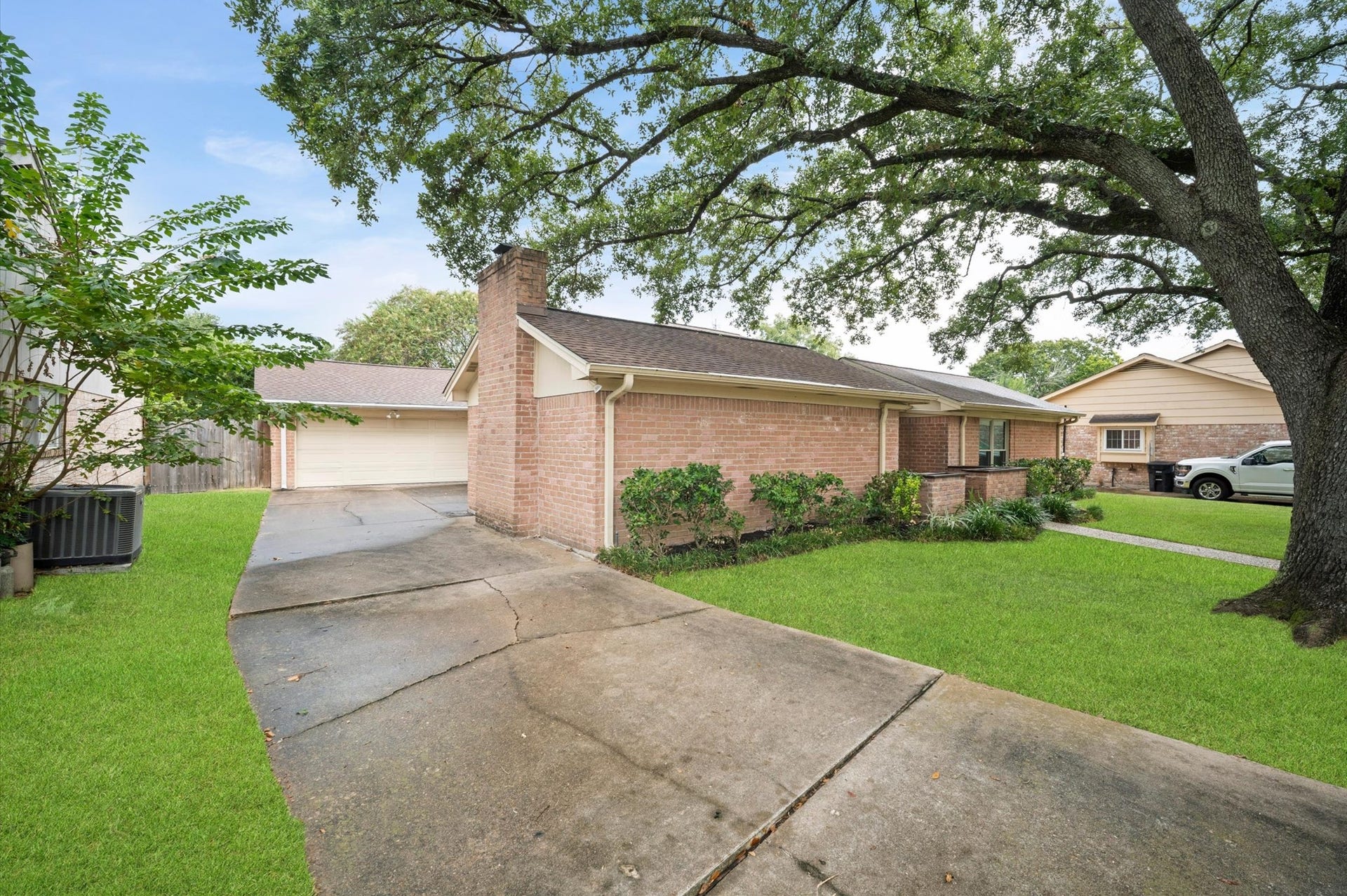 6114 Rollingbrook Drive, Houston, TX 77096 Beautiful trees, detached garage with extra storage and a nice sized lot!