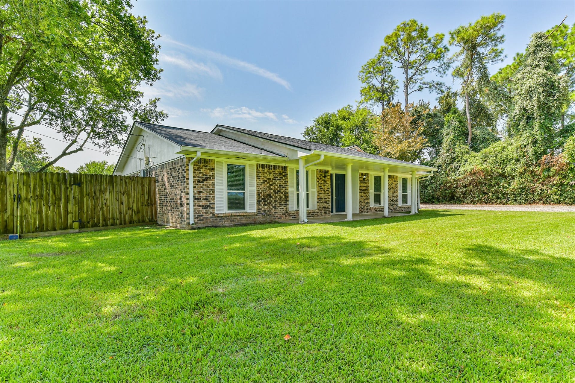 9311 Masters Road, Manvel, TX 77578 Discover your perfect retreat in this charming home, featuring a spacious yard and inviting porch. Enjoy serene living with lush surroundings. Welcome home!