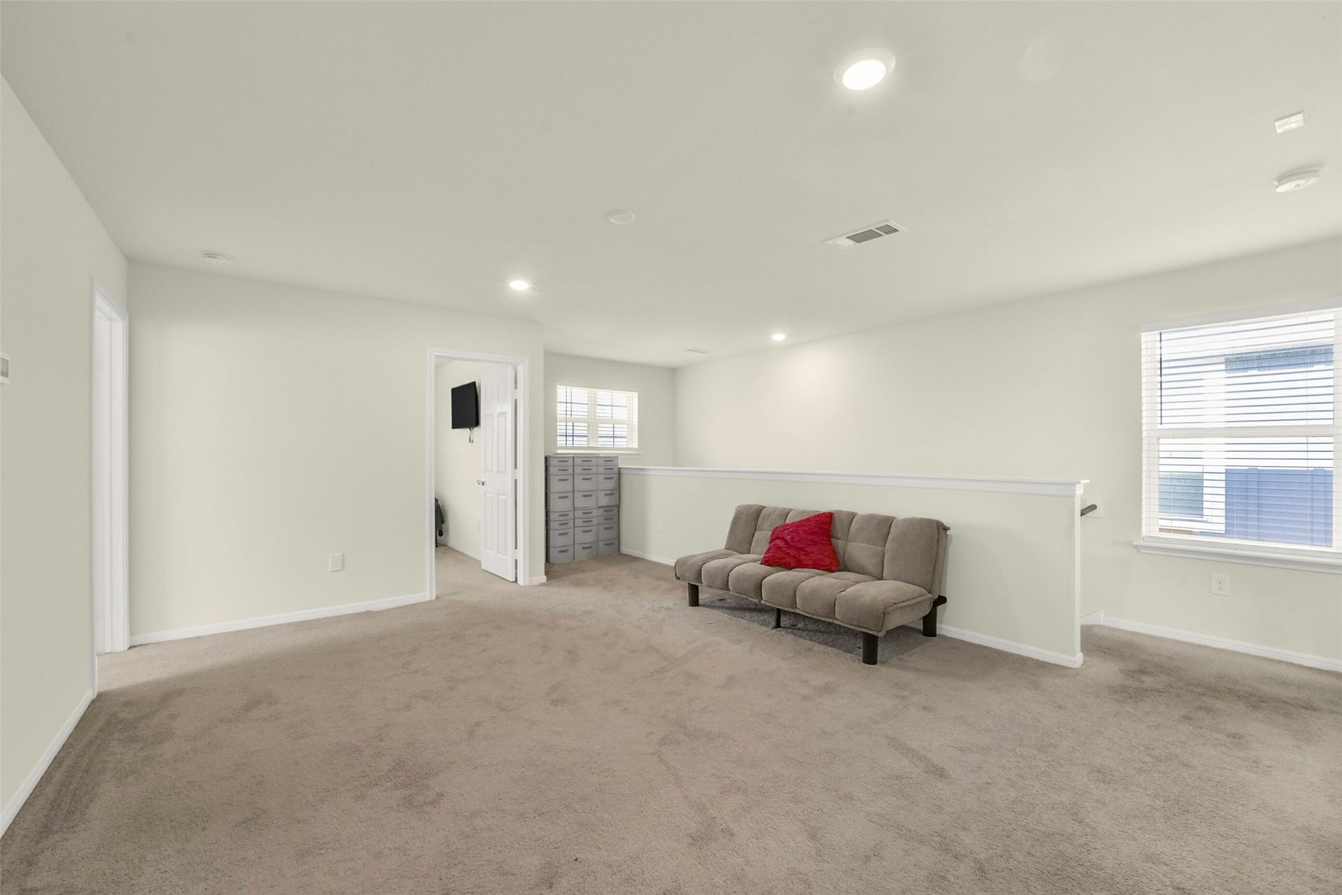 Huge game room as you go up the stairs.