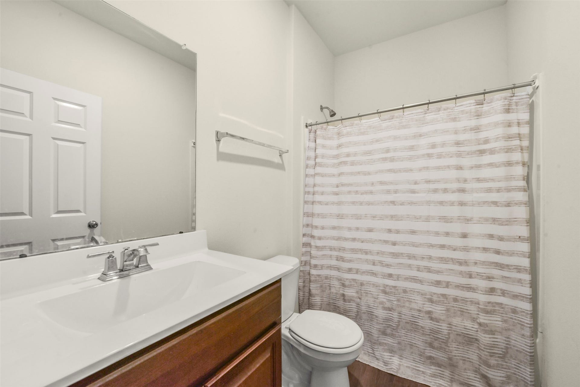 Full bathroom on the first floor for the guest bedroom and guests.