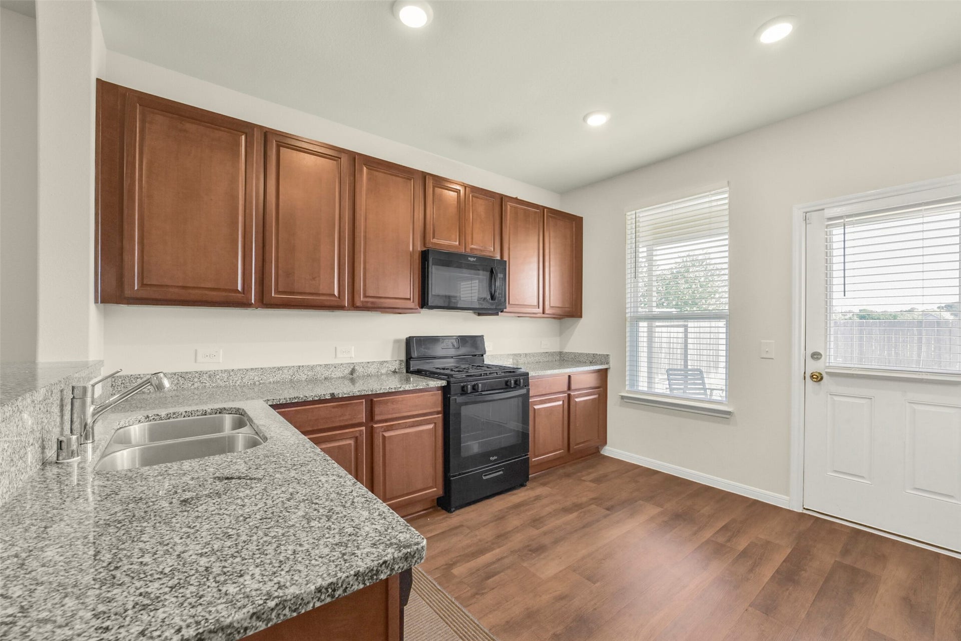 Kitchen also has direct access to the covered patio, convenient for entertaining or your morning coffee.
