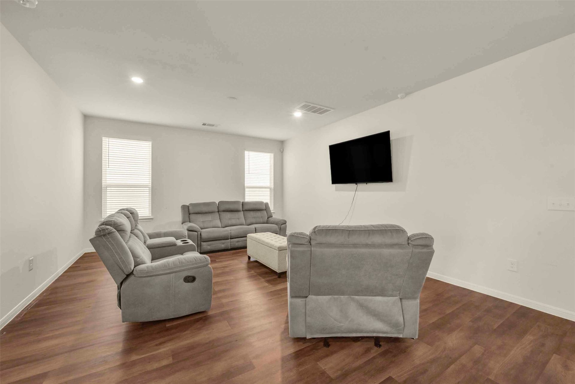 Living room can acomodate a full living room furniture set and more.
