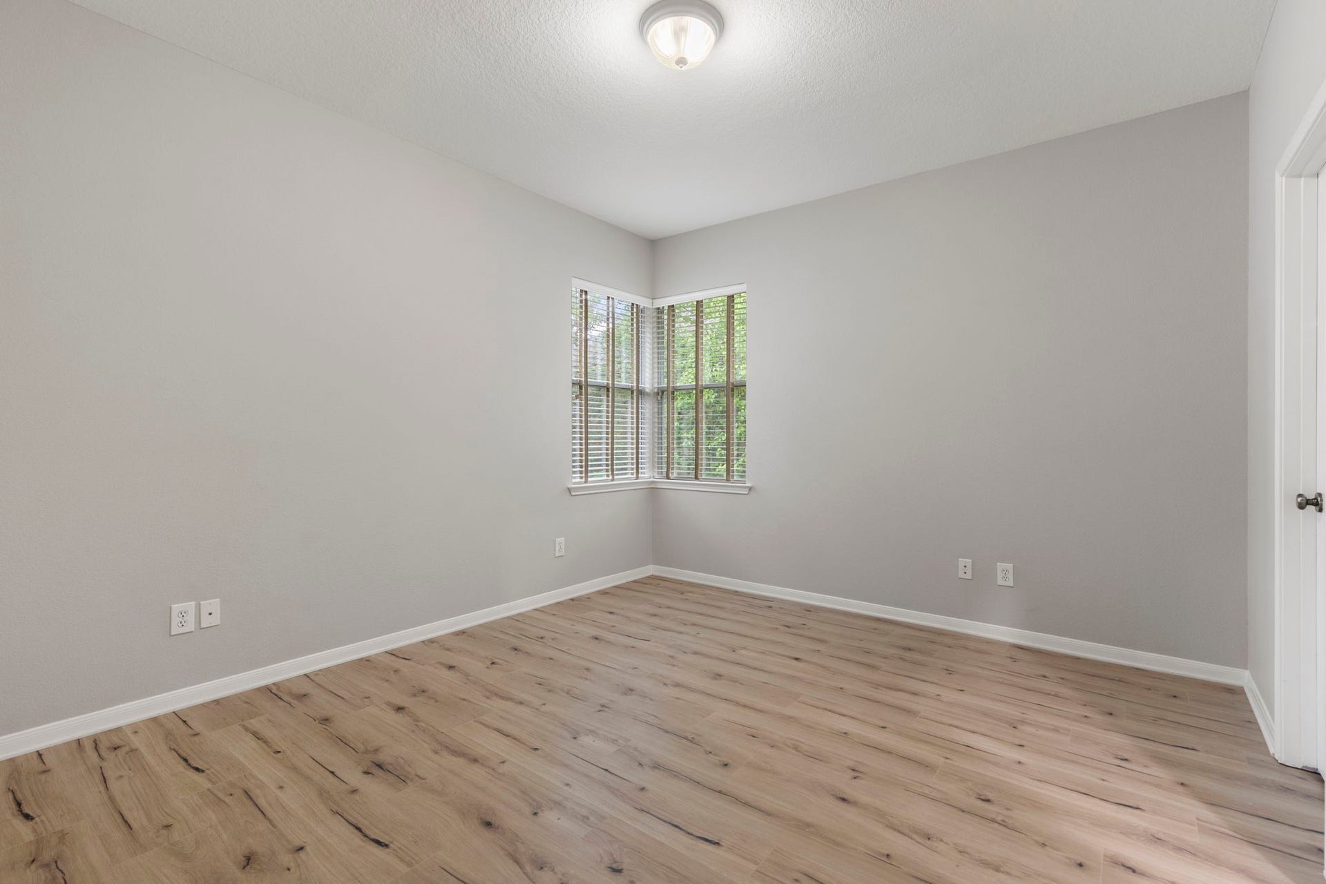 3 S Altwood Circle, The Woodlands, TX 77382 The first of three Secondary Bedrooms on the second floor.