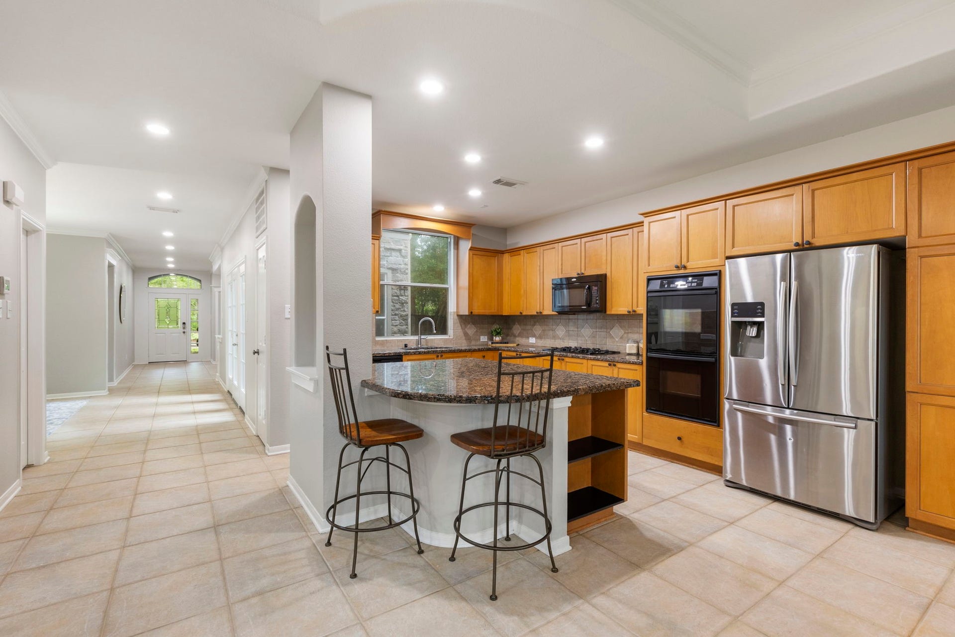 3 S Altwood Circle, The Woodlands, TX 77382 The Kitchen provides lots of counterspace with a lot of cabinets!