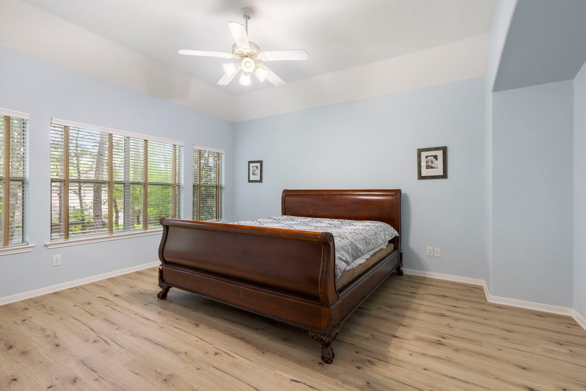 3 S Altwood Circle, The Woodlands, TX 77382 The spacious room has plenty of space for a king size bed, and additional furniture.