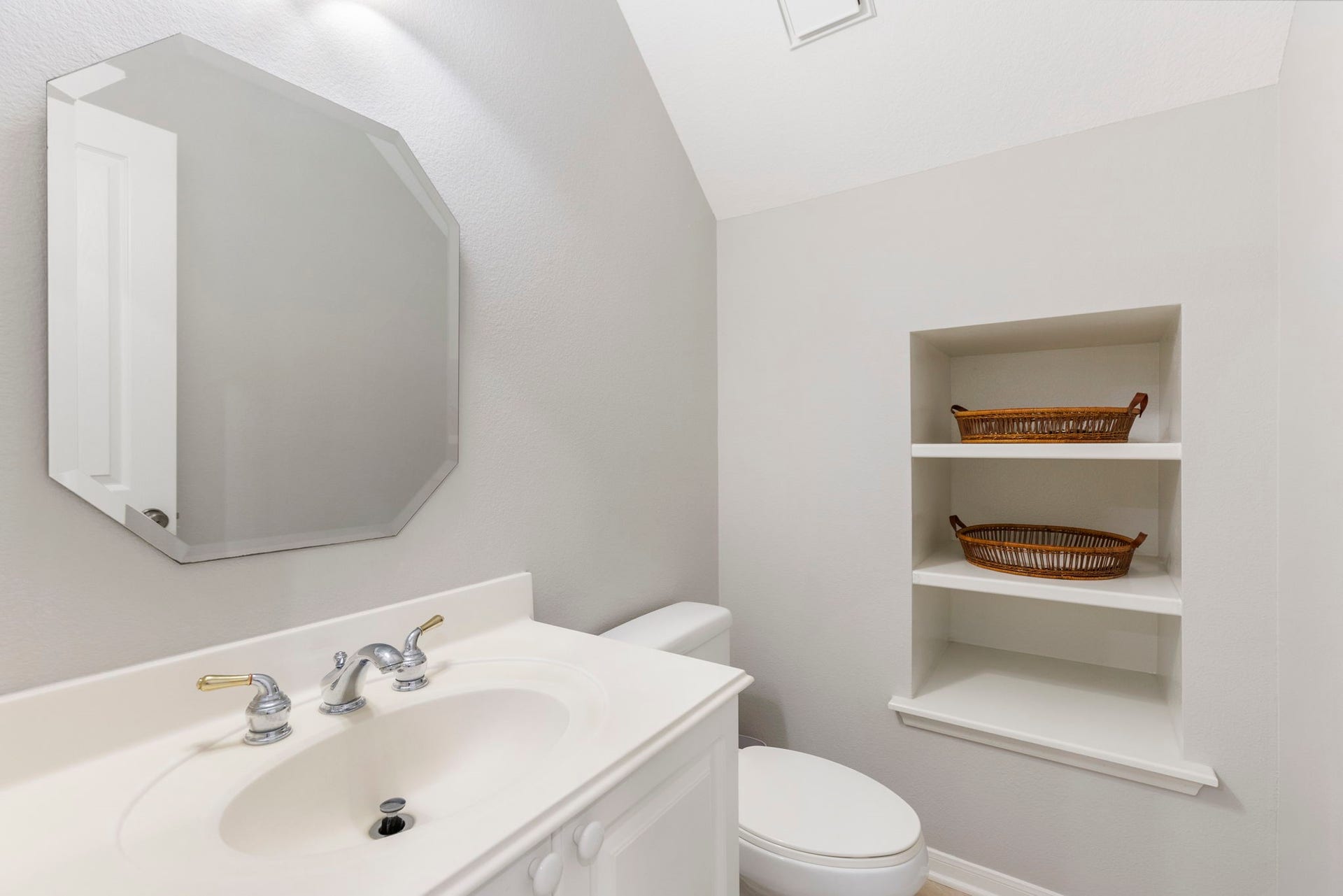 3 S Altwood Circle, The Woodlands, TX 77382 There is a half bathroom for your guests.