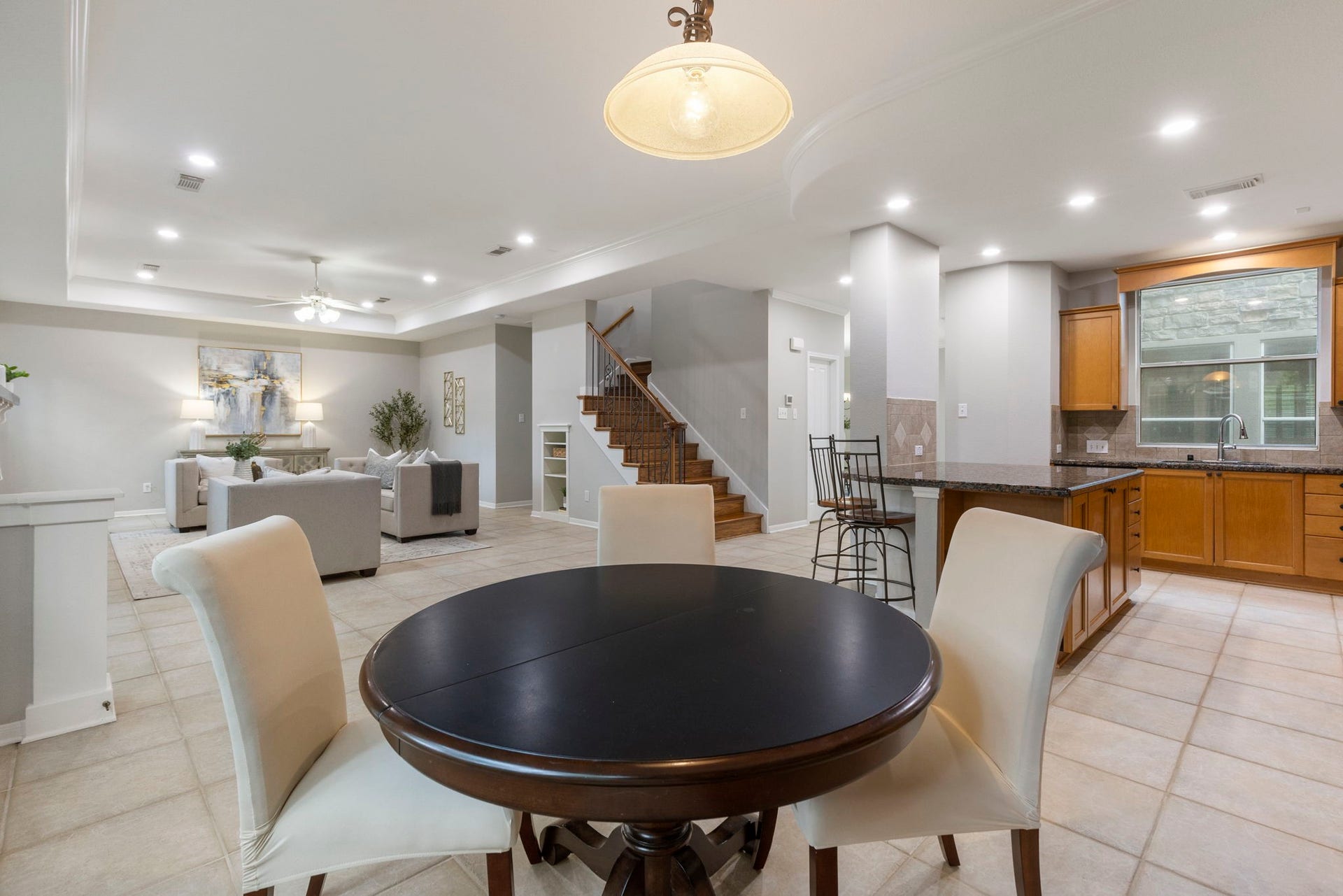 3 S Altwood Circle, The Woodlands, TX 77382 From the informal eating space, you can enjoy the entire area from the Kitchen, Dining Area, and the Living Room.
