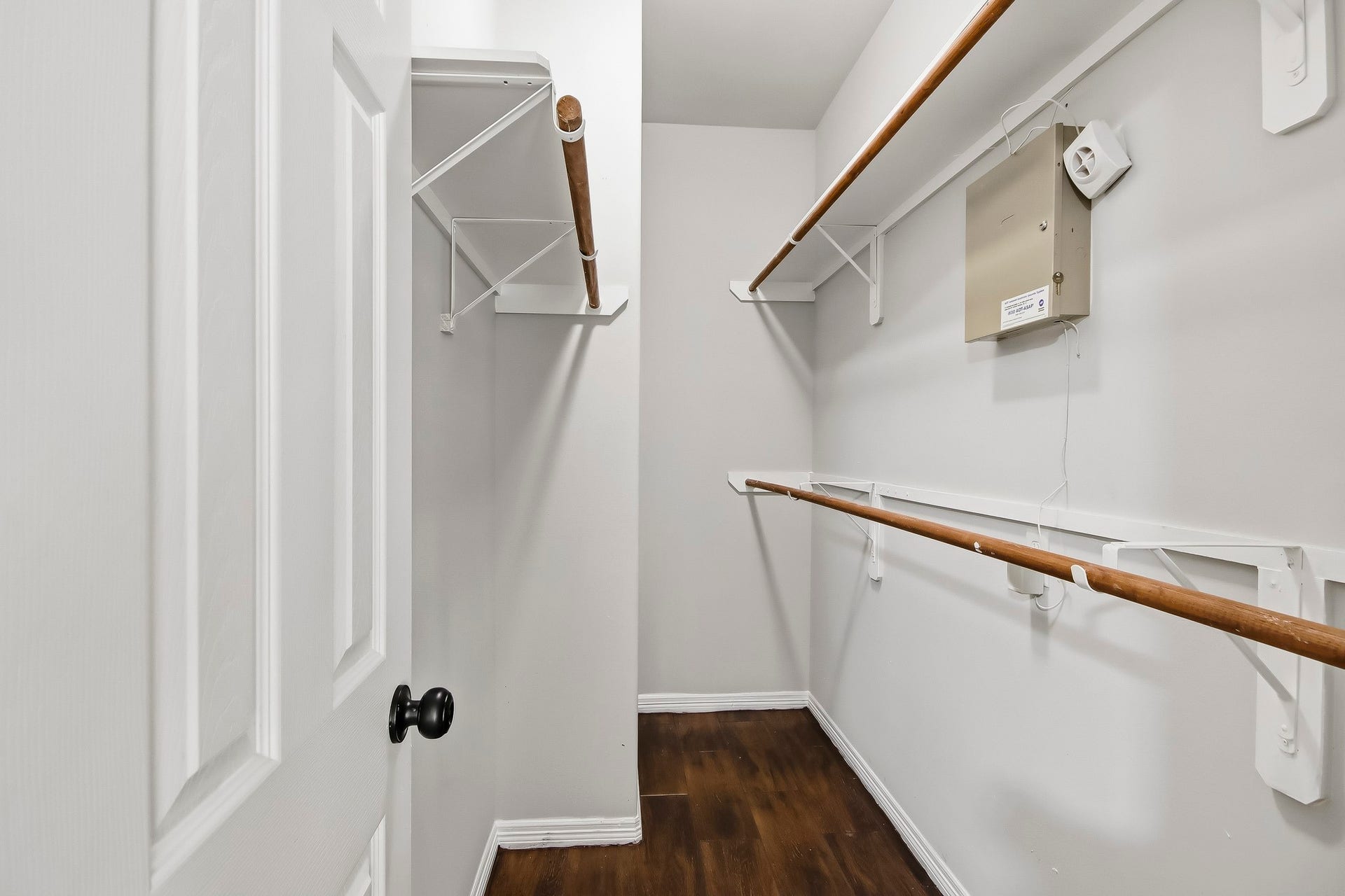10023 Checkerberry Park Lane, Tomball, TX 77375 This spacious walk-in closet offers exceptional storage efficiency with built-in multi-level hanging rods and integrated overhead shelving.