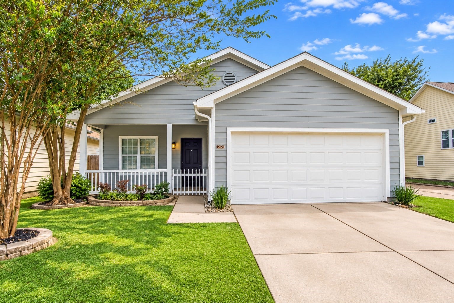 10023 Checkerberry Park Lane, Tomball, TX 77375 The spacious double-car garage and wide concrete driveway provide ample off-street parking, while the bright front window and cozy entry alcove make this residence feel instantly welcoming.