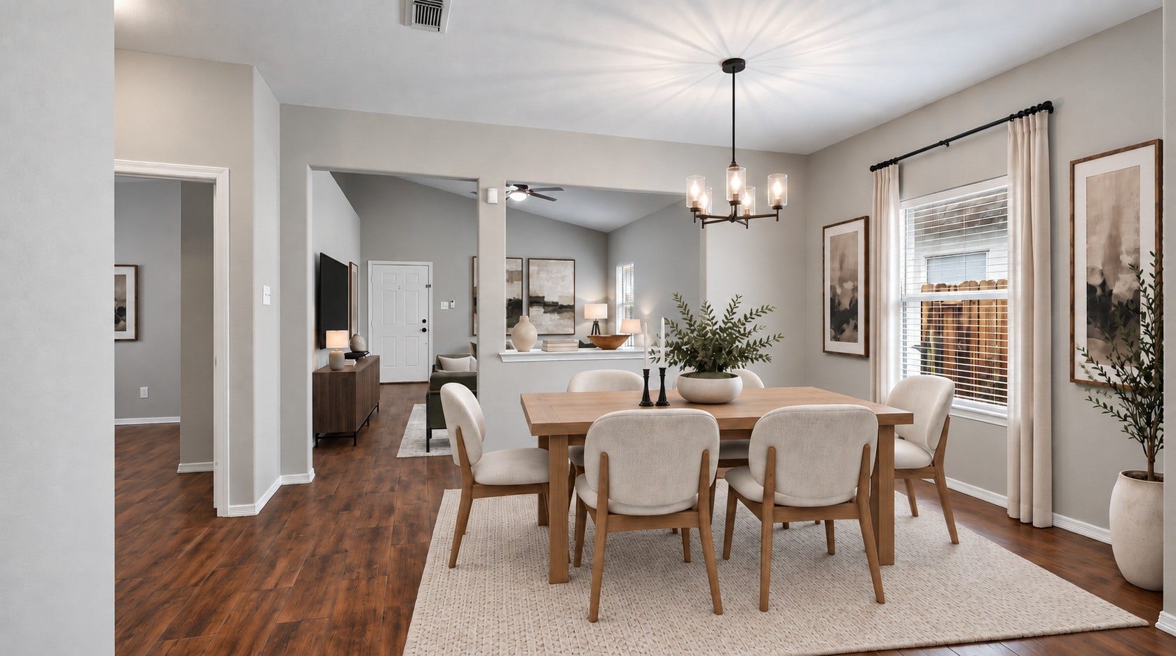 10023 Checkerberry Park Lane, Tomball, TX 77375 Virtually Staged: The combination of warm flooring finishes, high ceiling height, and bright window placement creates a comfortable, welcoming backdrop for gatherings.