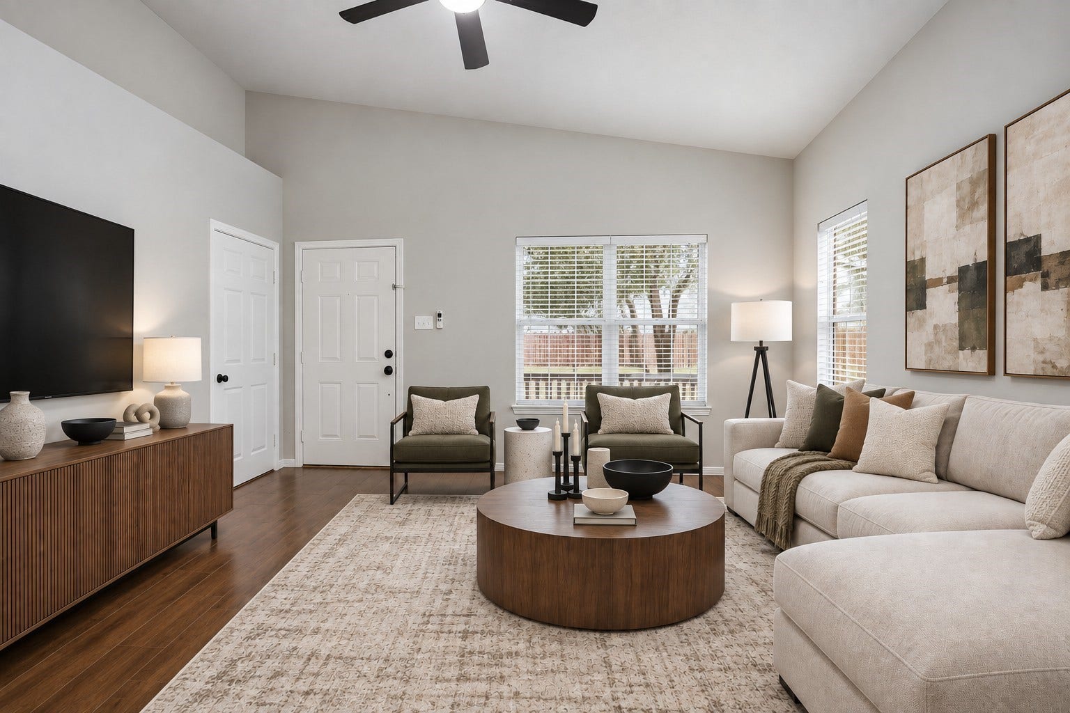 10023 Checkerberry Park Lane, Tomball, TX 77375 Virtually Staged: This angle showcases the open volume of the living room, where broad windows bring in rich natural light.