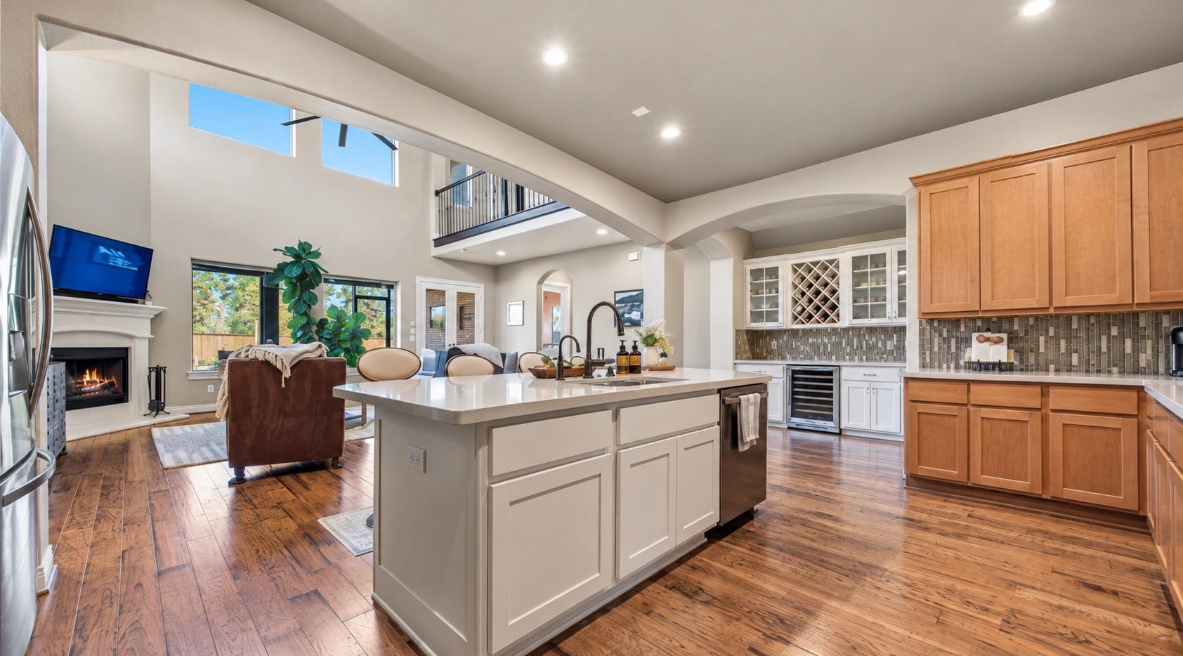 Spacious kitchen with custom cabinetry, center island and open connection to the living areas.