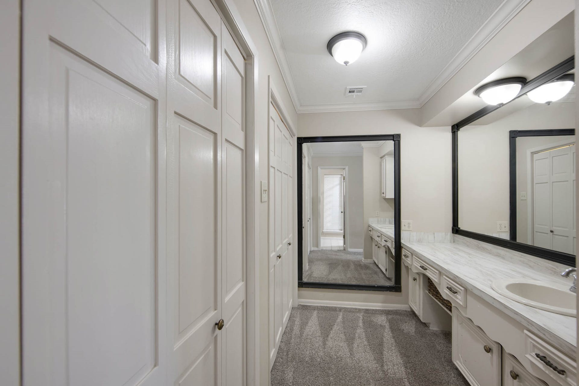 View of vanity and closet