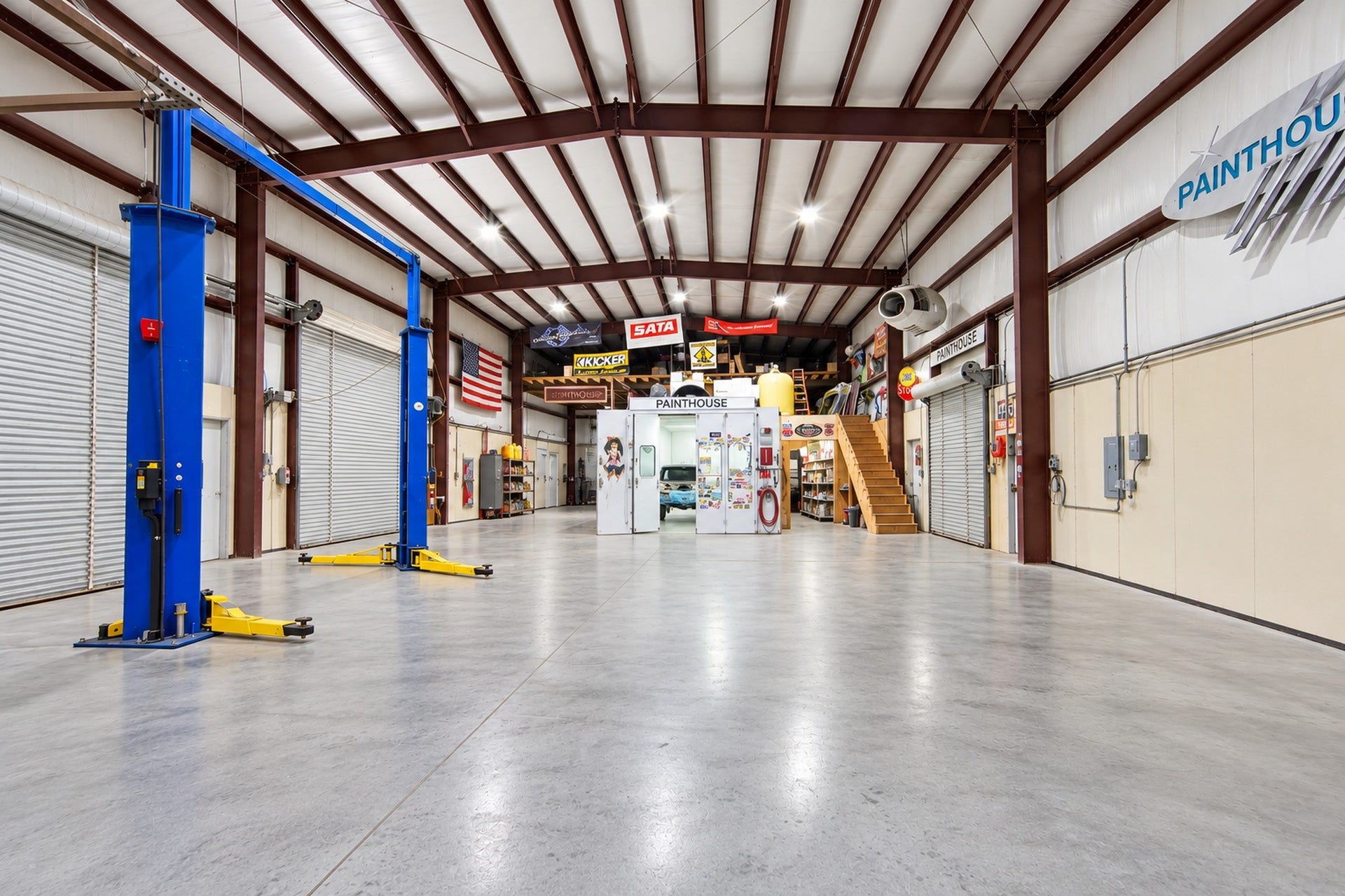 The shop has multiple lifts, 3 phase power, and substantial compressed-air infrastructure