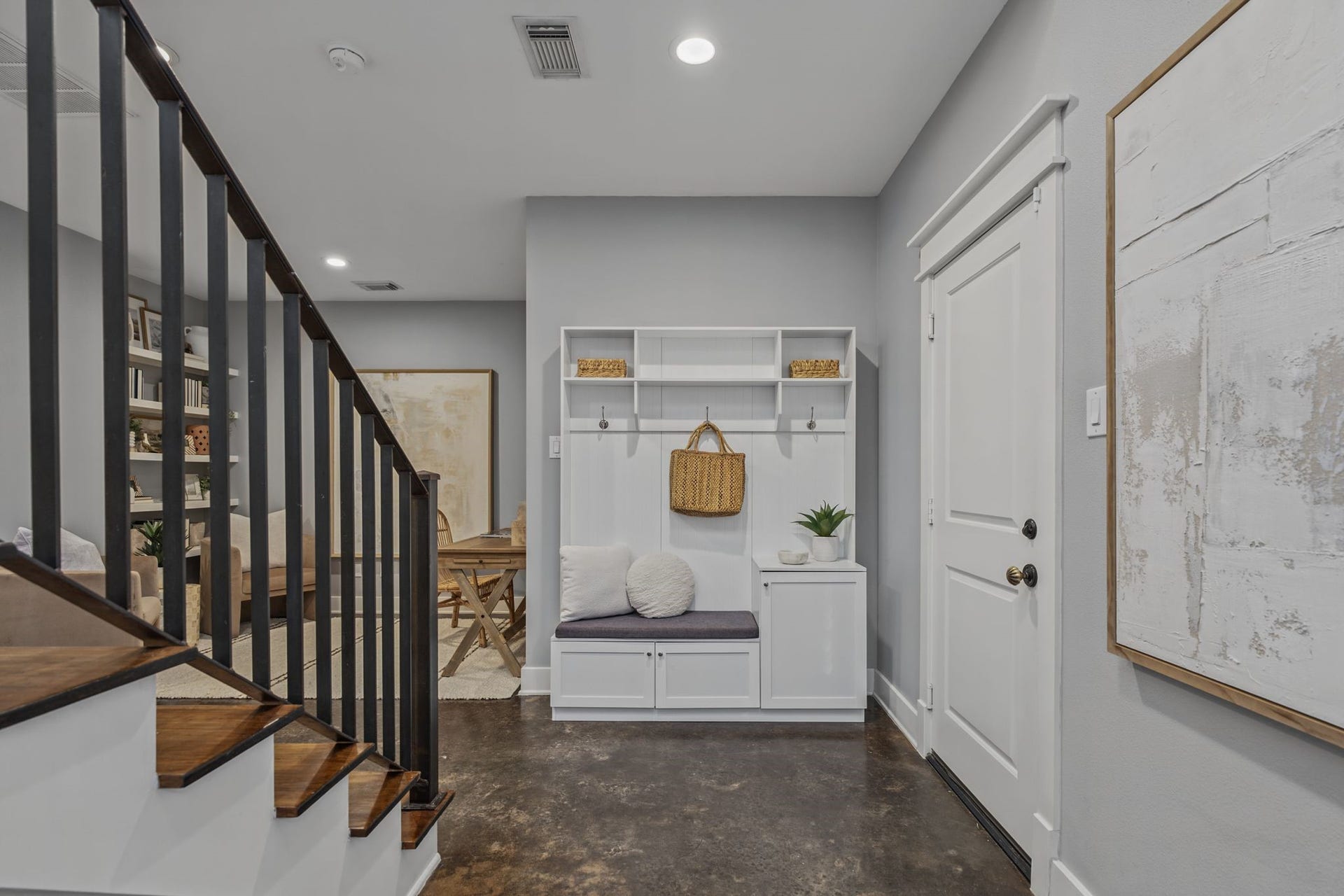 1517 Blair Street, Houston, TX 77008 Upon entry you're greeted by polished concrete floors that anchor a versatile first-level layout.