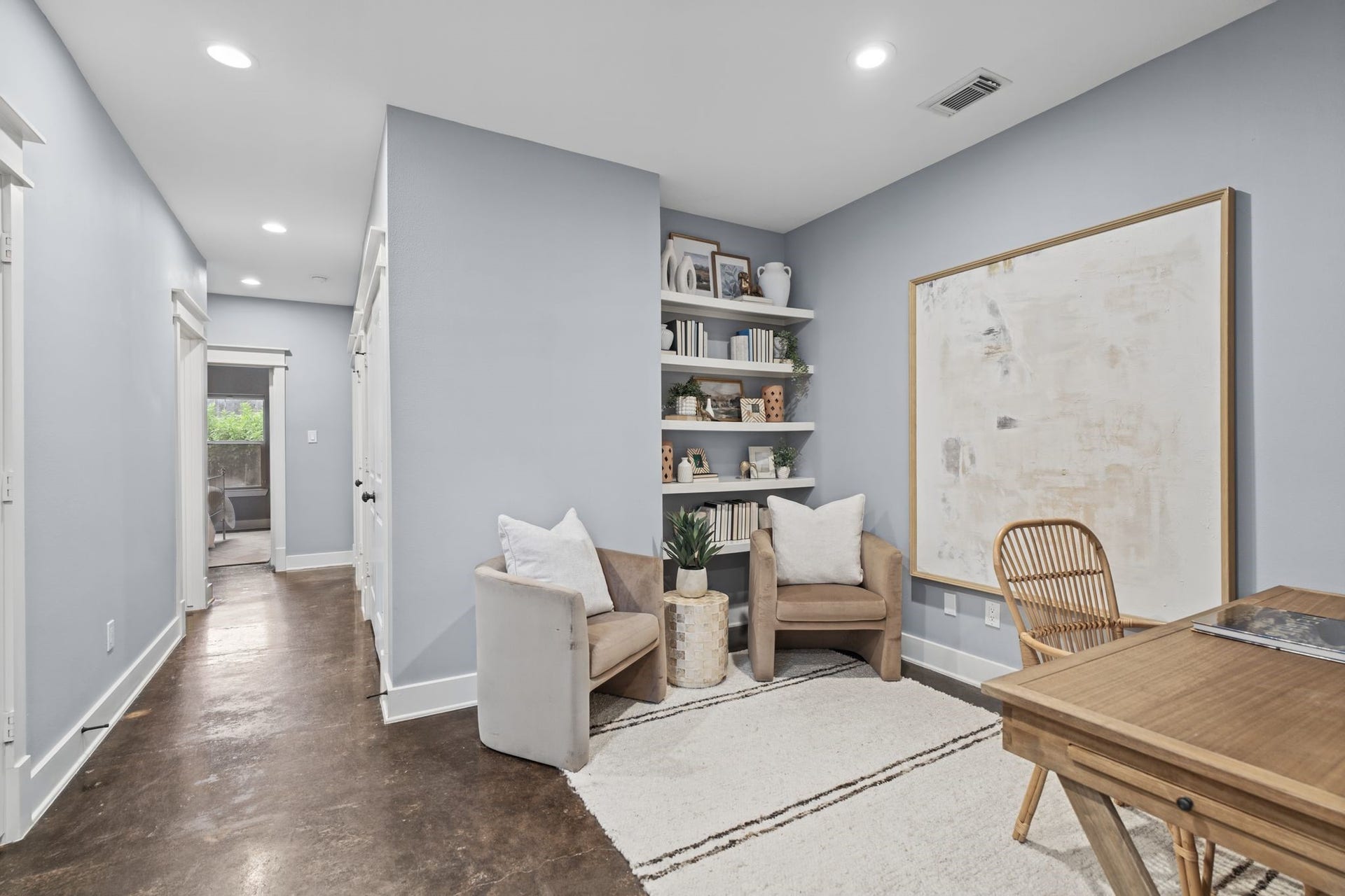 1517 Blair Street, Houston, TX 77008 A versatile flex space with built-in shelves, ideal for a home office or study.