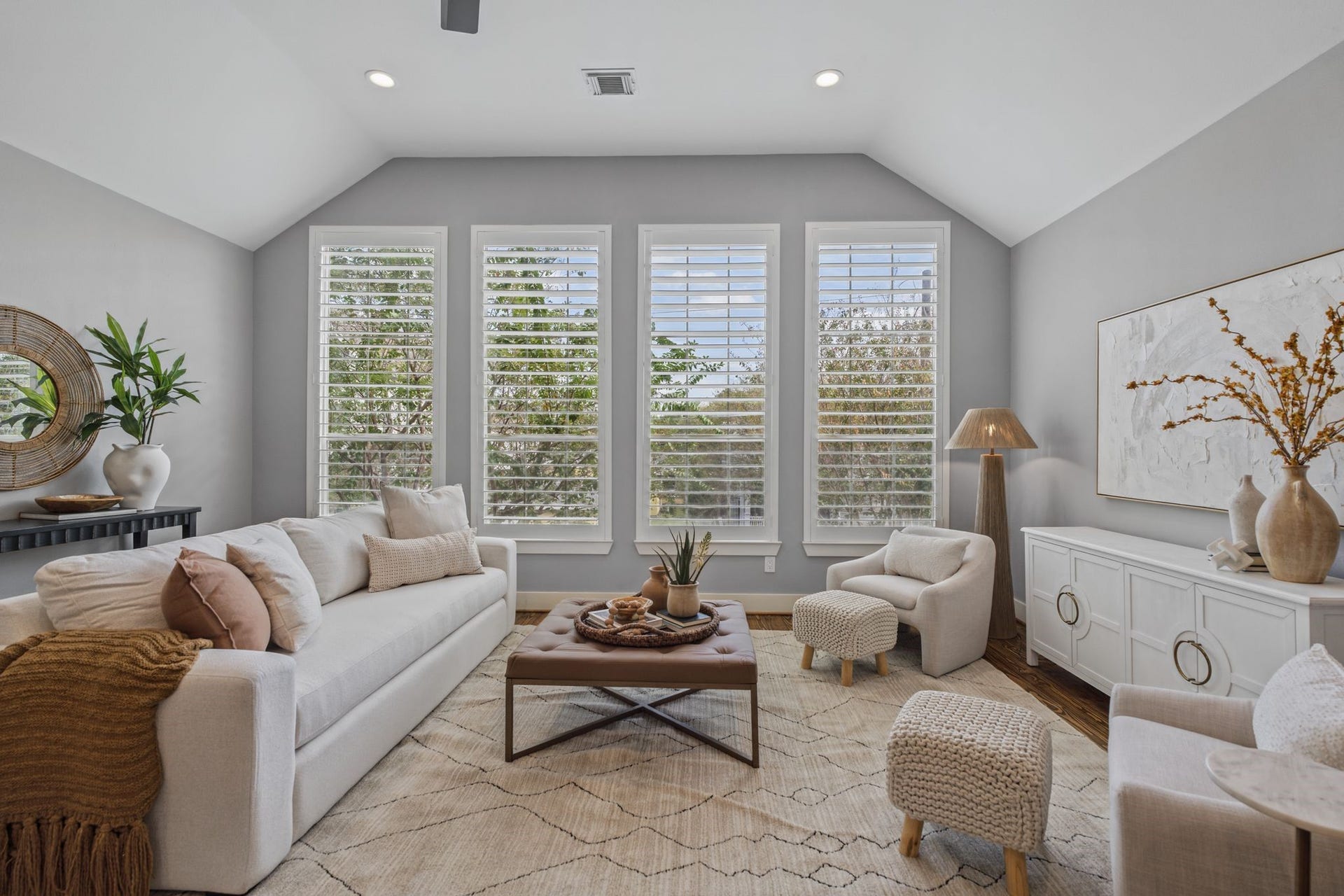 1517 Blair Street, Houston, TX 77008 The second floor opens to an expansive living and dining area, filled with natural light from a wall of windows overlooking the front of the home.