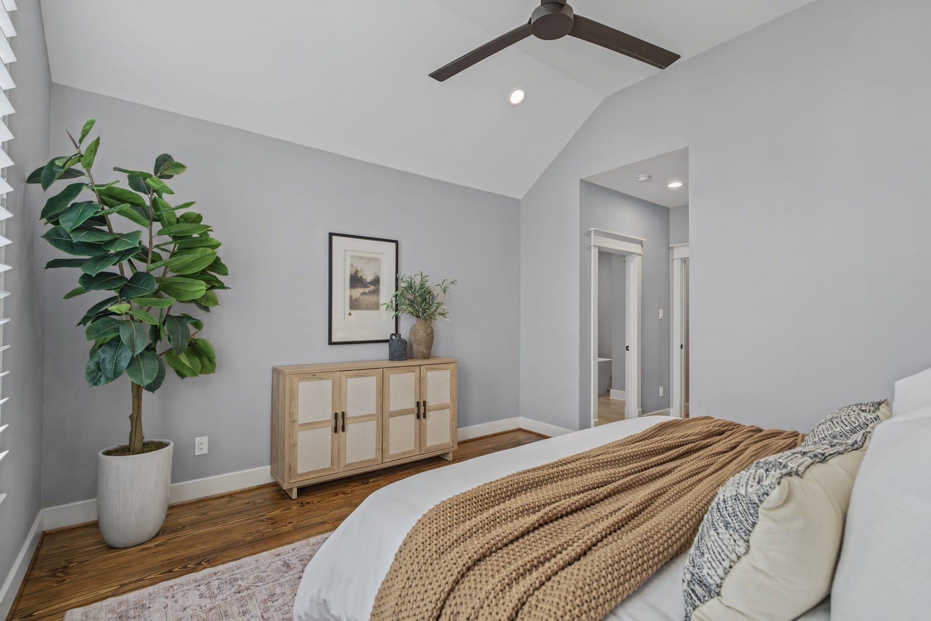 1517 Blair Street, Houston, TX 77008 Natural light and private backyard views create a relaxing atmosphere in this second floor primary.