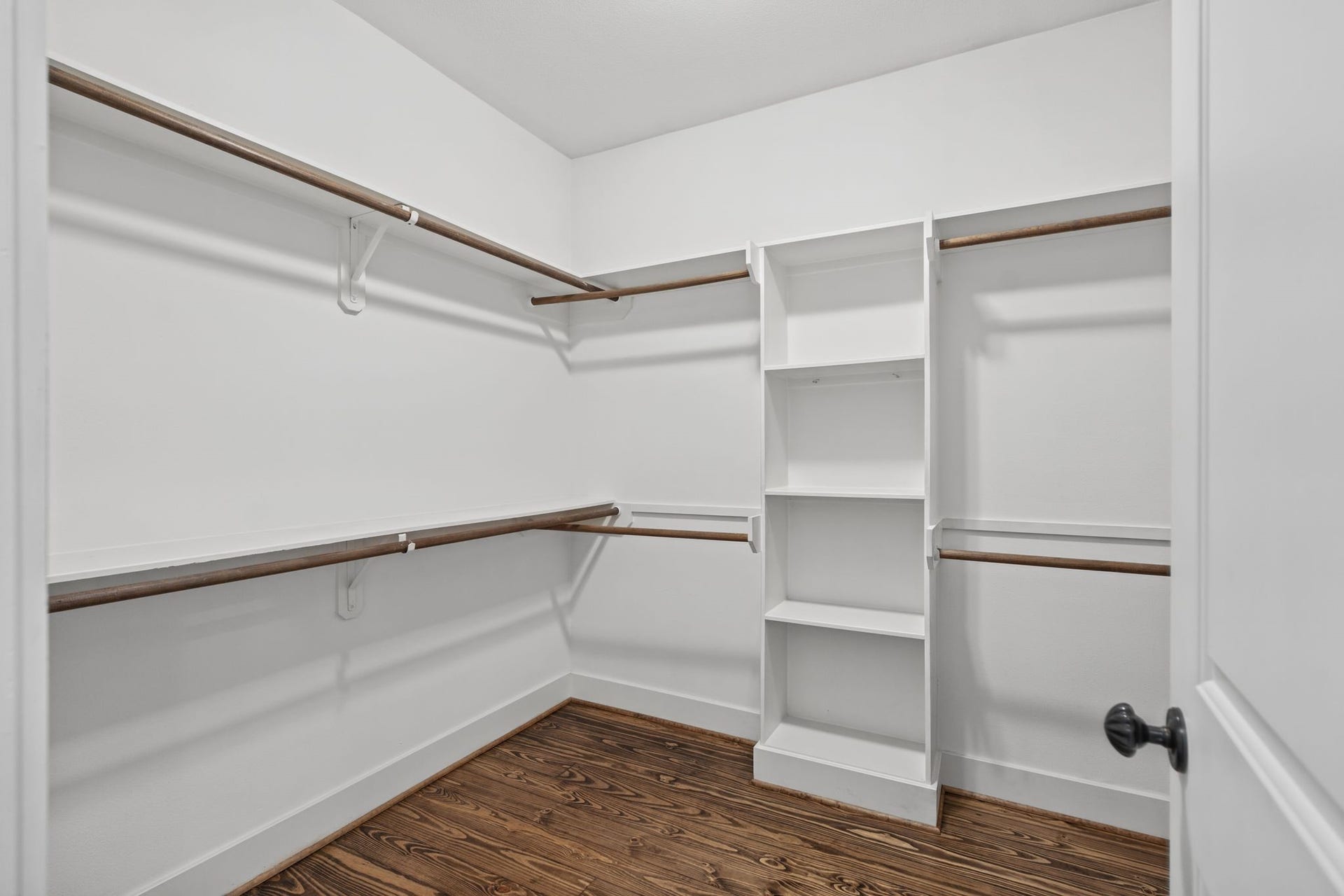 1517 Blair Street, Houston, TX 77008 The generously sized primary closet offers ample room for wardrobe organization and storage.