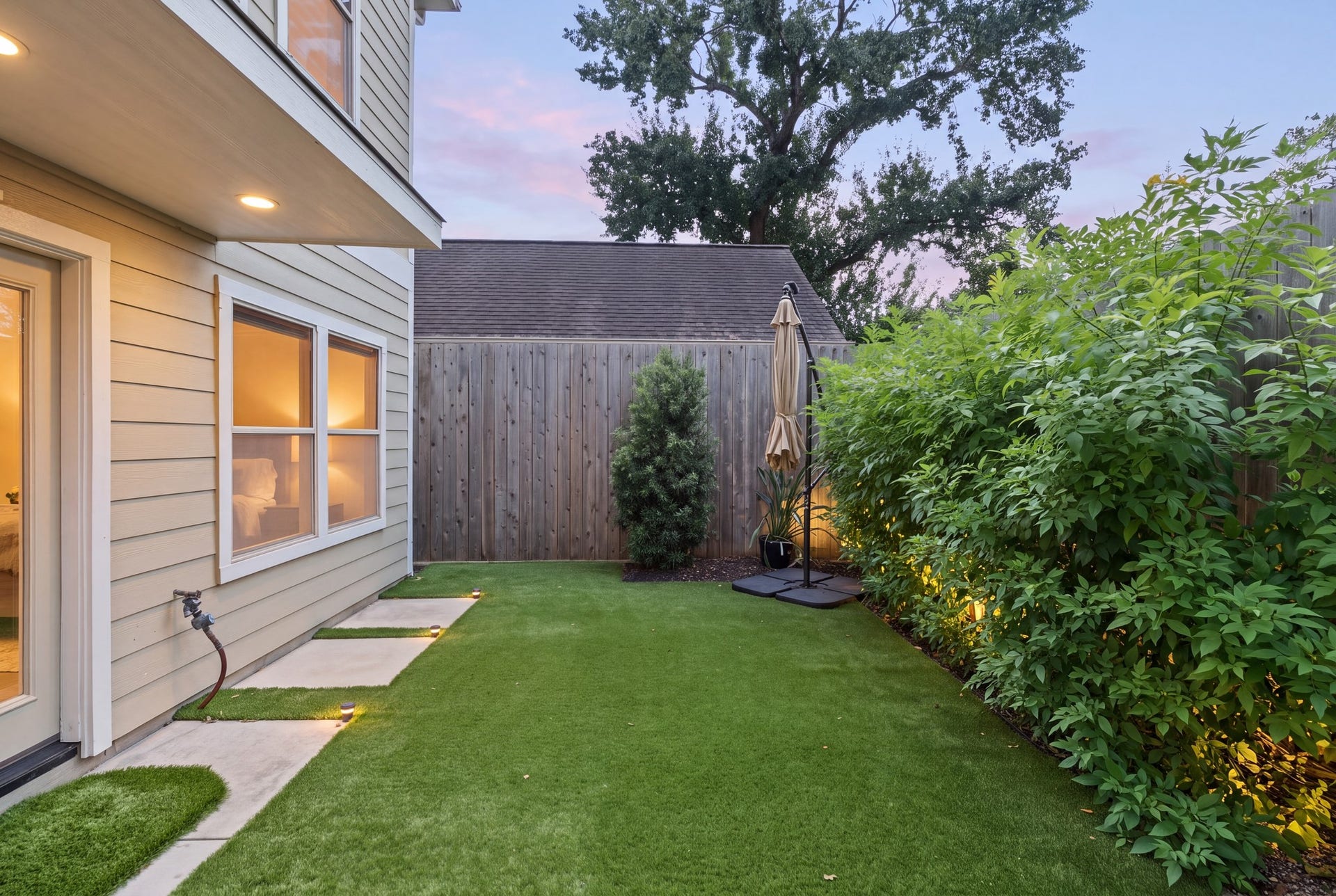1517 Blair Street, Houston, TX 77008 The private backyard features premium artificial turf installed in September 2024.