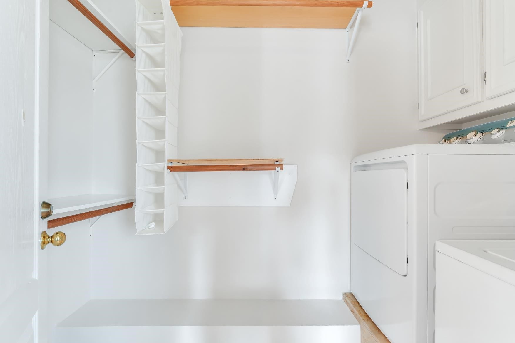 There is a set of washer/dryer in primary closet.