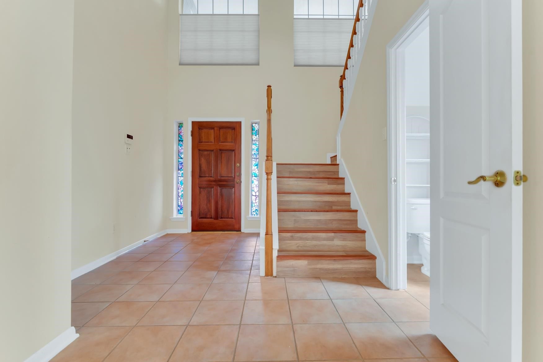 This inviting inertance features soaring ceiling & fresh paint, setting a bright and welcoming tone.