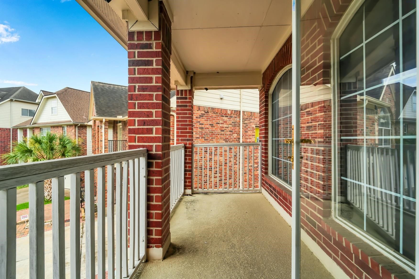 Enjoy the tranquility of a private balcony off primary bedroom.