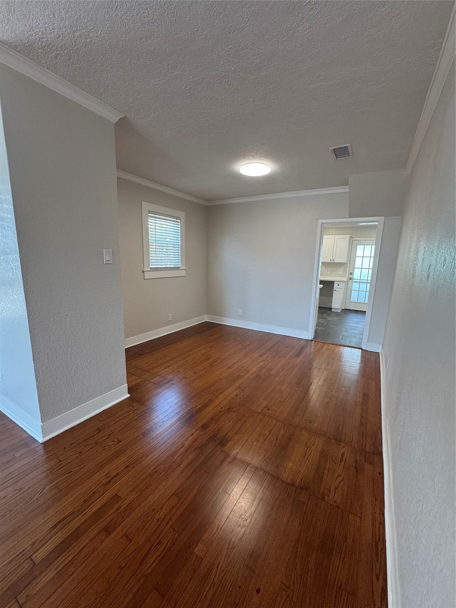 5208 Bernardo de Galvez, Galveston, TX 77551 Dining room dining off of the living room. Could be an office or secondary living area.