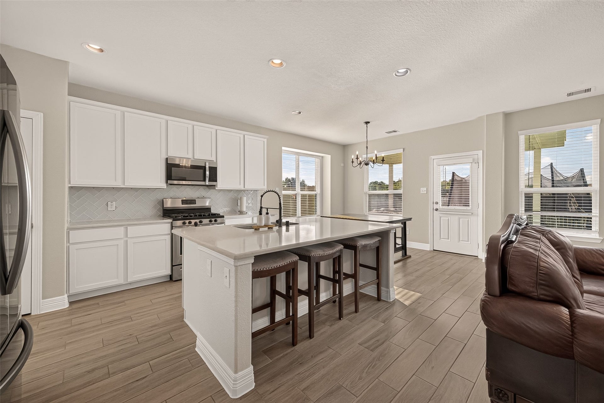 3603 Gentle Meadow Drive, Richmond, TX 77406 Huge central island kitchen with breakfast bar seating