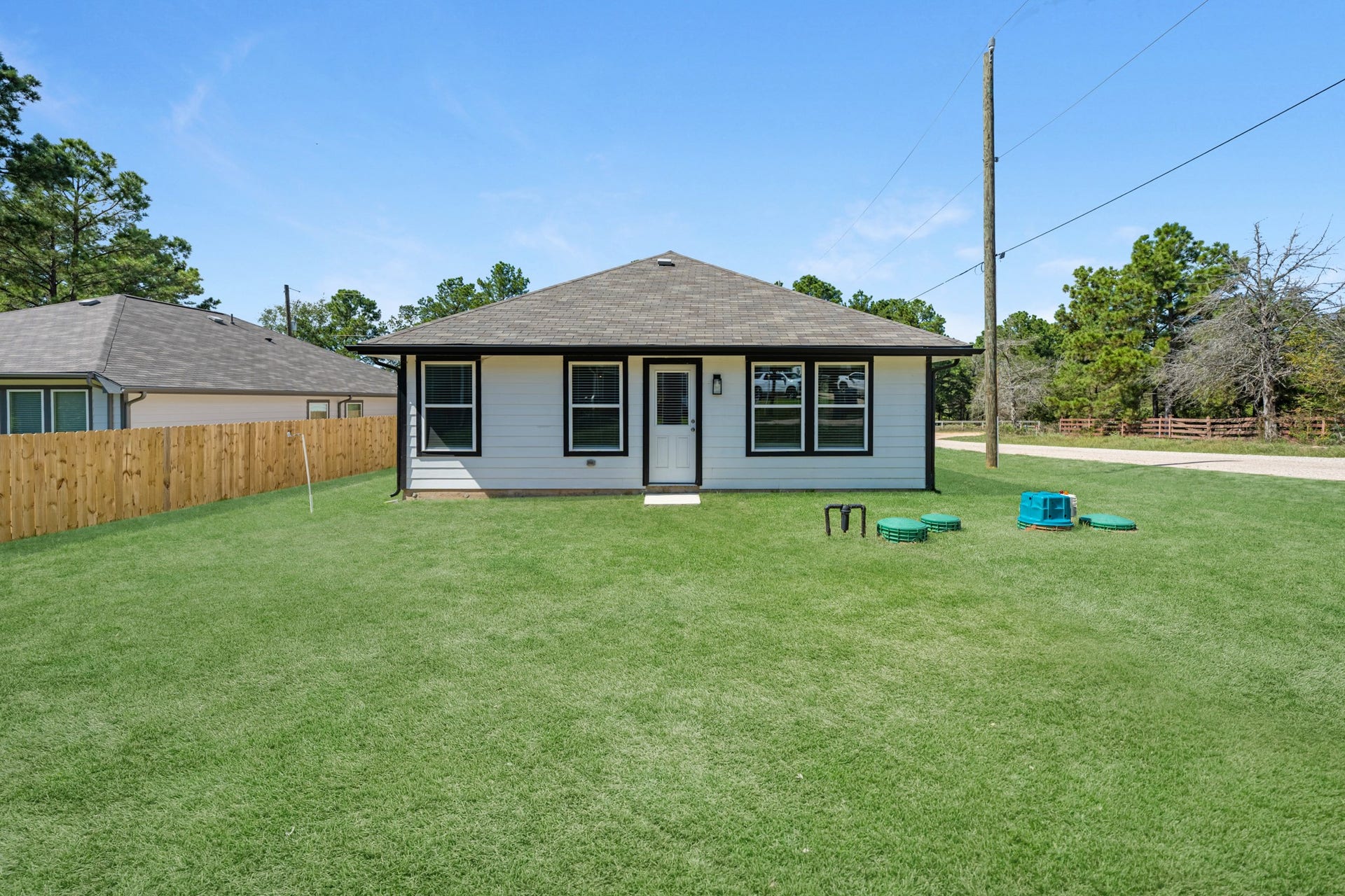 26439 Lakeshore Drive, Hempstead, TX 77445 View of the back of the home. No side neighbors on one side!