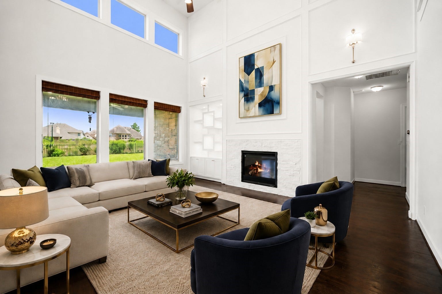 3622 Sage Hollow Drive, Spring, TX 77386 The spectacular family room features dramatic, soaring double-volume ceilings and upper-tier fixed glass windows that bathe the open-concept footprint in refreshing sunlight. Virtually staged.