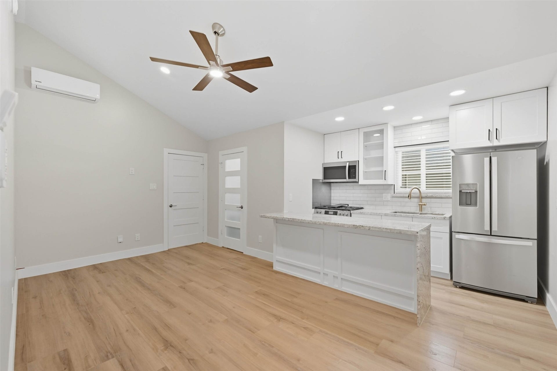 10930 White Thorn Street, #B, Houston, TX 77016 The spacious family room features an open layout, creating a perfect gathering spot for family and friends.
