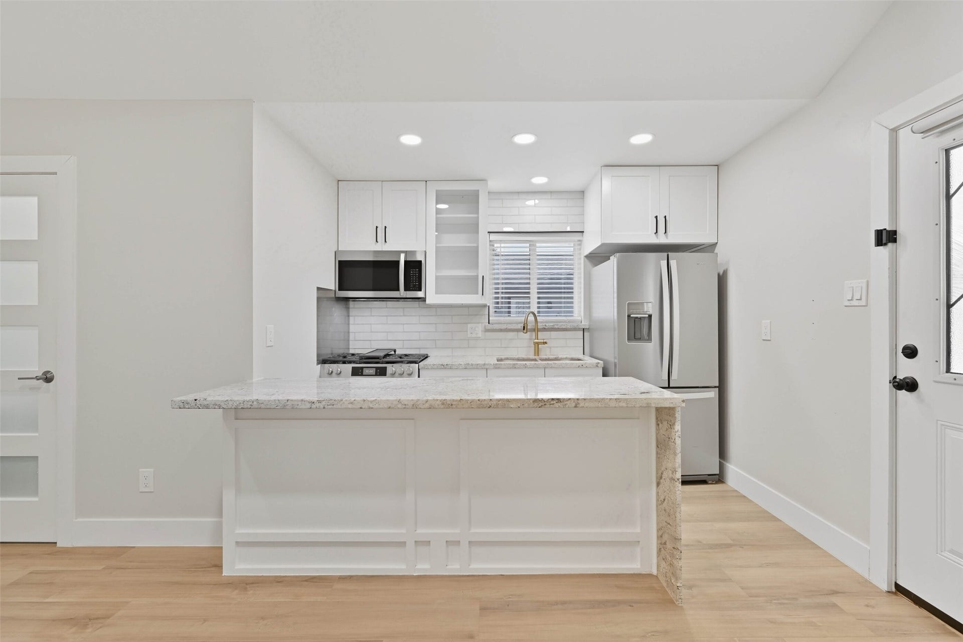 10930 White Thorn Street, #B, Houston, TX 77016 A perfect blend of function and style with plenty of workspace for cooking and gathering.
