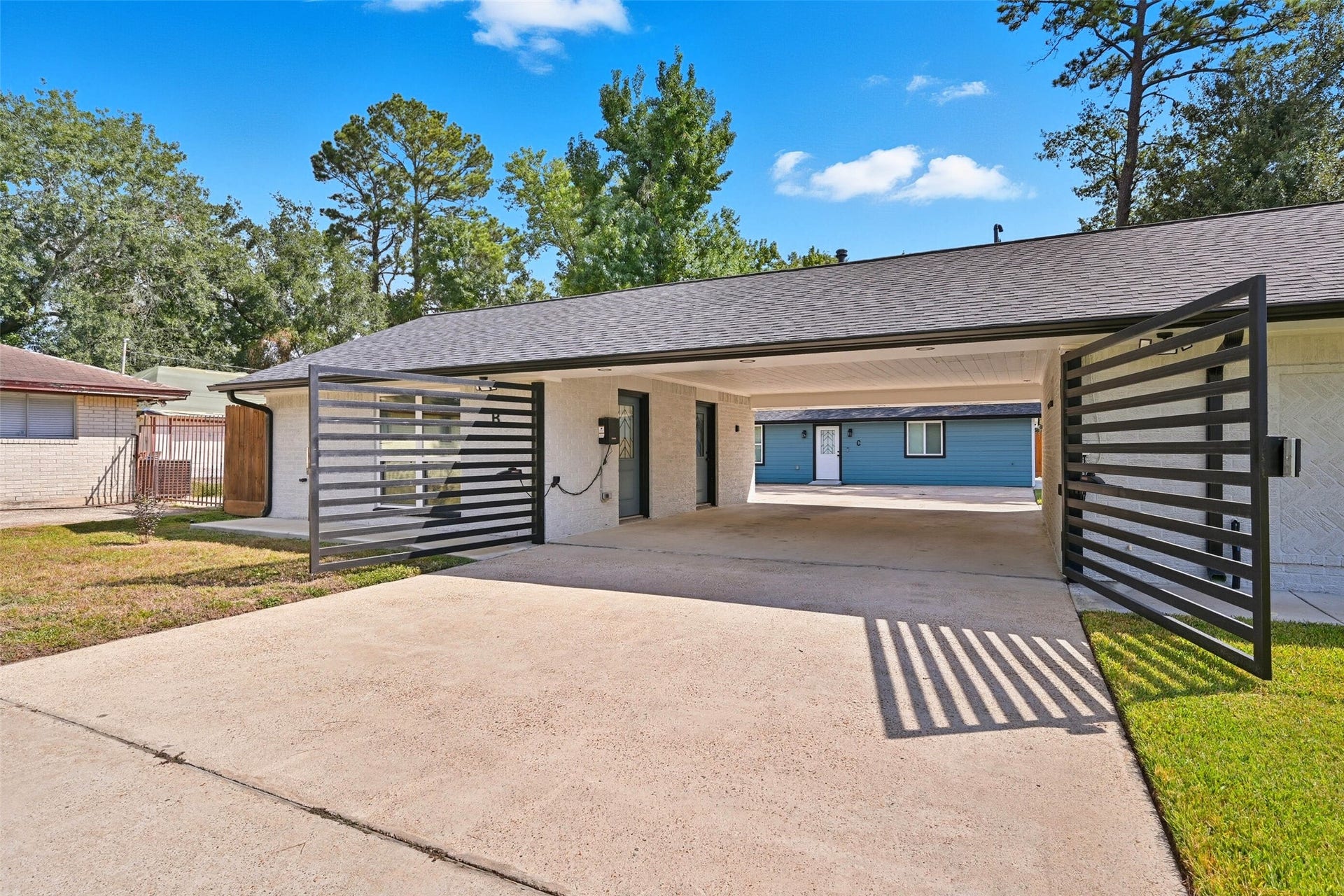 10930 White Thorn Street, #B, Houston, TX 77016 Double gates provide secure, controlled access in and out of the unit.