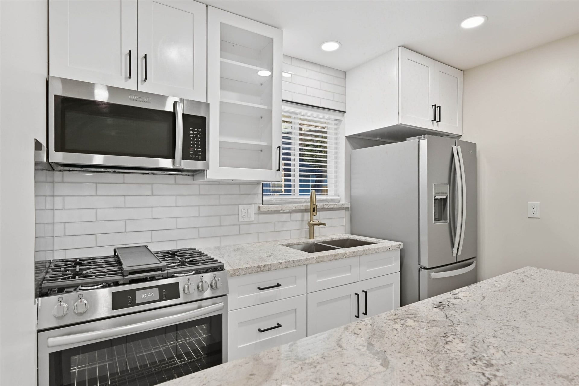 10930 White Thorn Street, #B, Houston, TX 77016 Modern finishes, sleek appliances, and upgraded cabinets make this kitchen stand out.